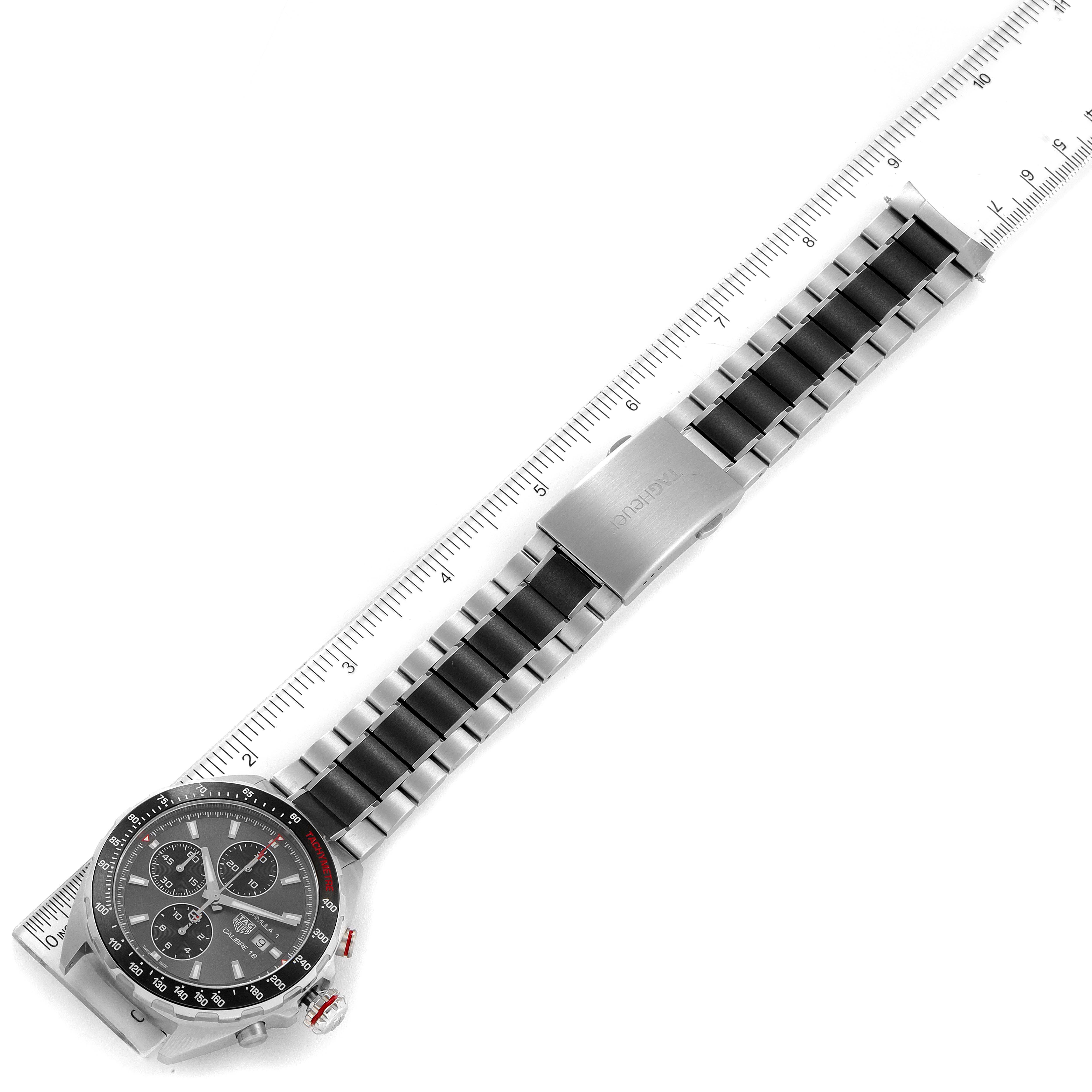 The image shows a top-down view of a Tag Heuer Formula 1 CAZ2012.BA0970 Men's Stainless Steel Grey Dial CAZ2012.BA0970 Men's Stainless Steel Grey Dial watch, featuring the face, bezel, crown, and full bracelet measuring approximately 7.5 inches.