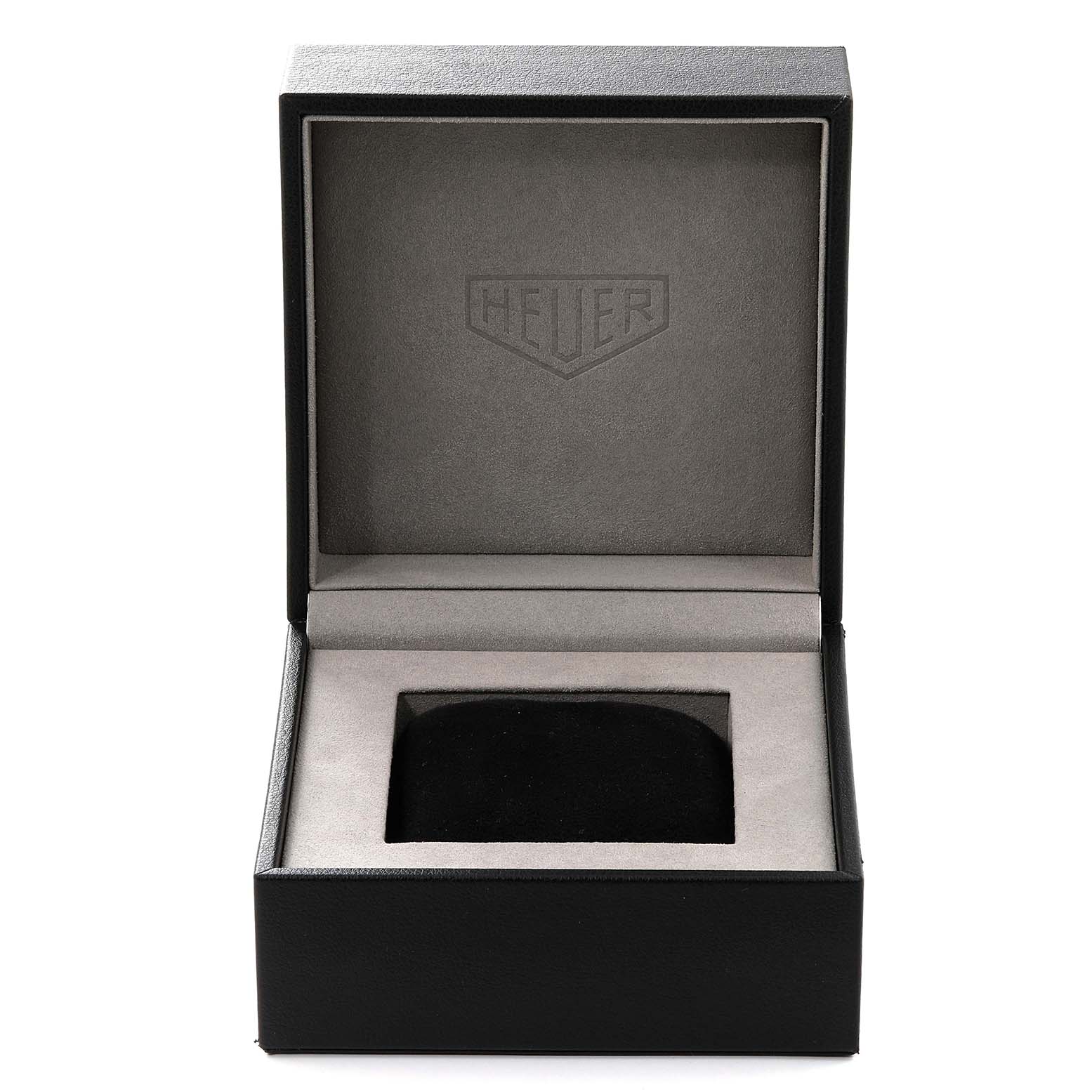 This image shows an open presentation box with the "Heuer" logo, for a Limited Edition Tag Heuer watch.