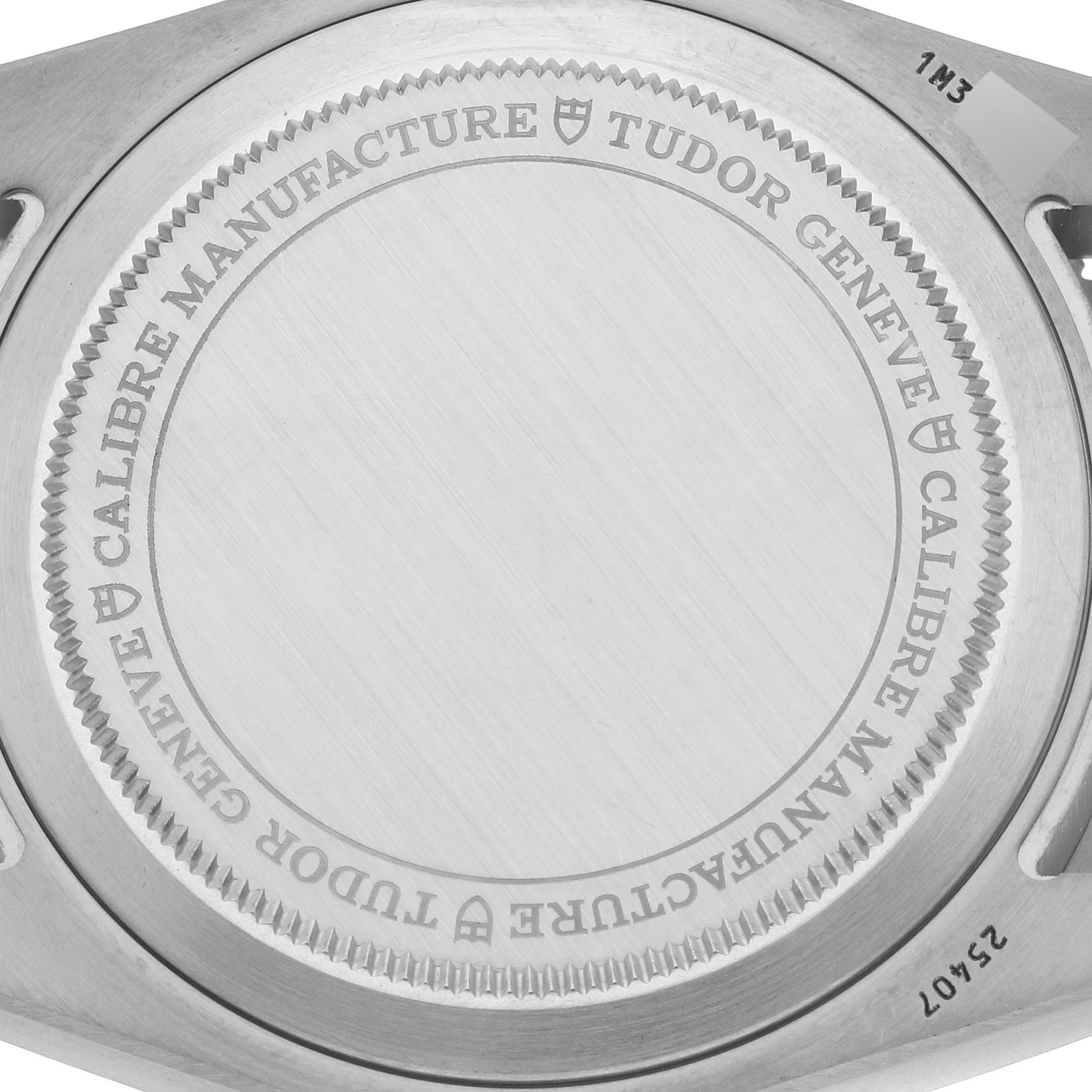 The image shows the back case of the Tudor Pelagos 25407N Men
s Titanium Black Dial 25407N Men
s Titanium Black Dial watch at a close-up angle.