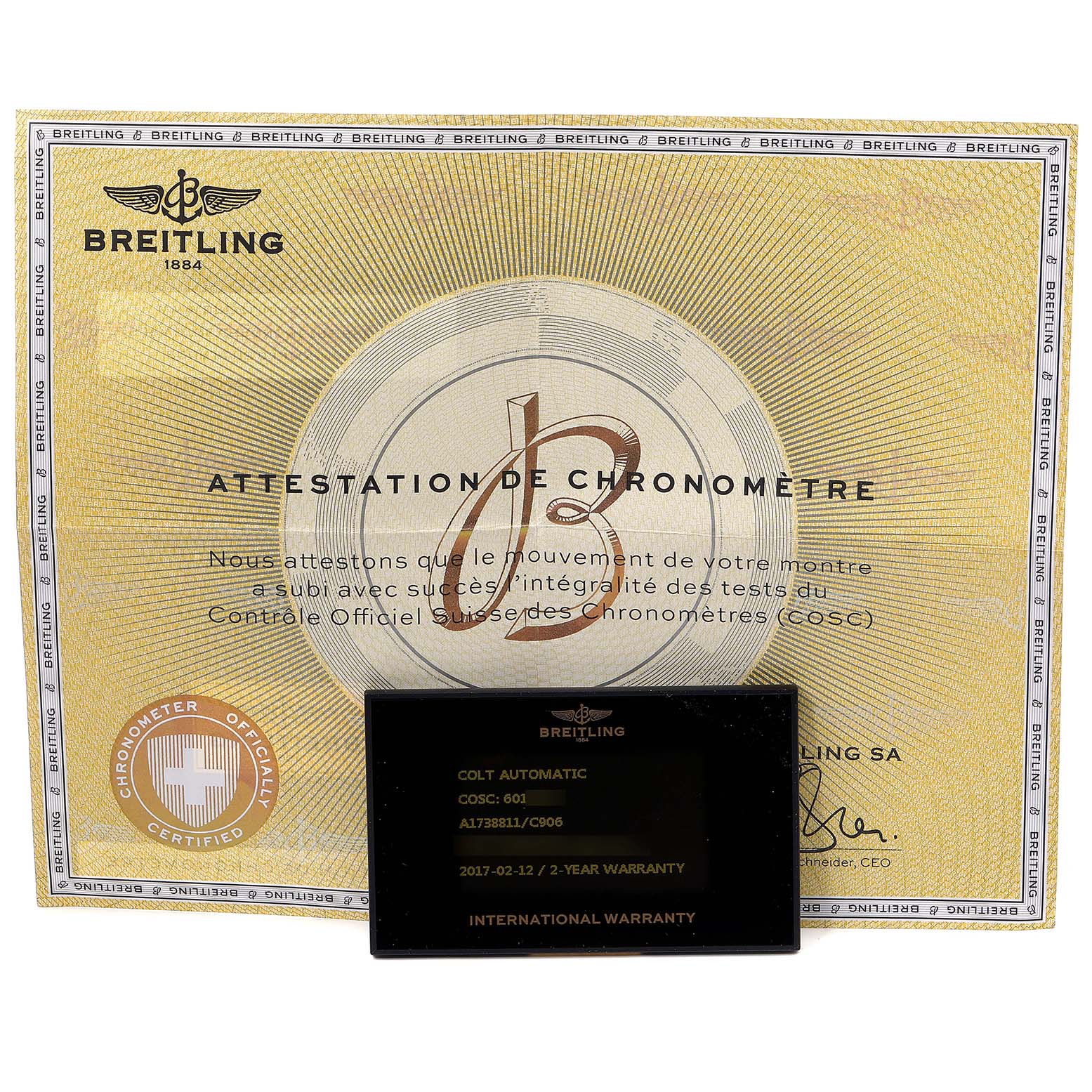 The image shows a Breitling Colt A17388 Men's Stainless Steel Blue Dial A17388 Men's Stainless Steel Blue Dial model warranty card and chronometer certification document.