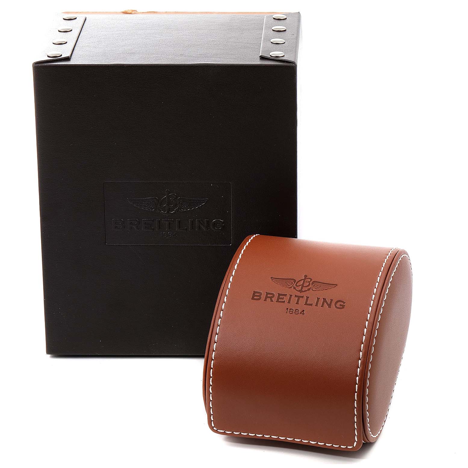 The image shows the packaging and a leather case for the Superocean model by Breitling.