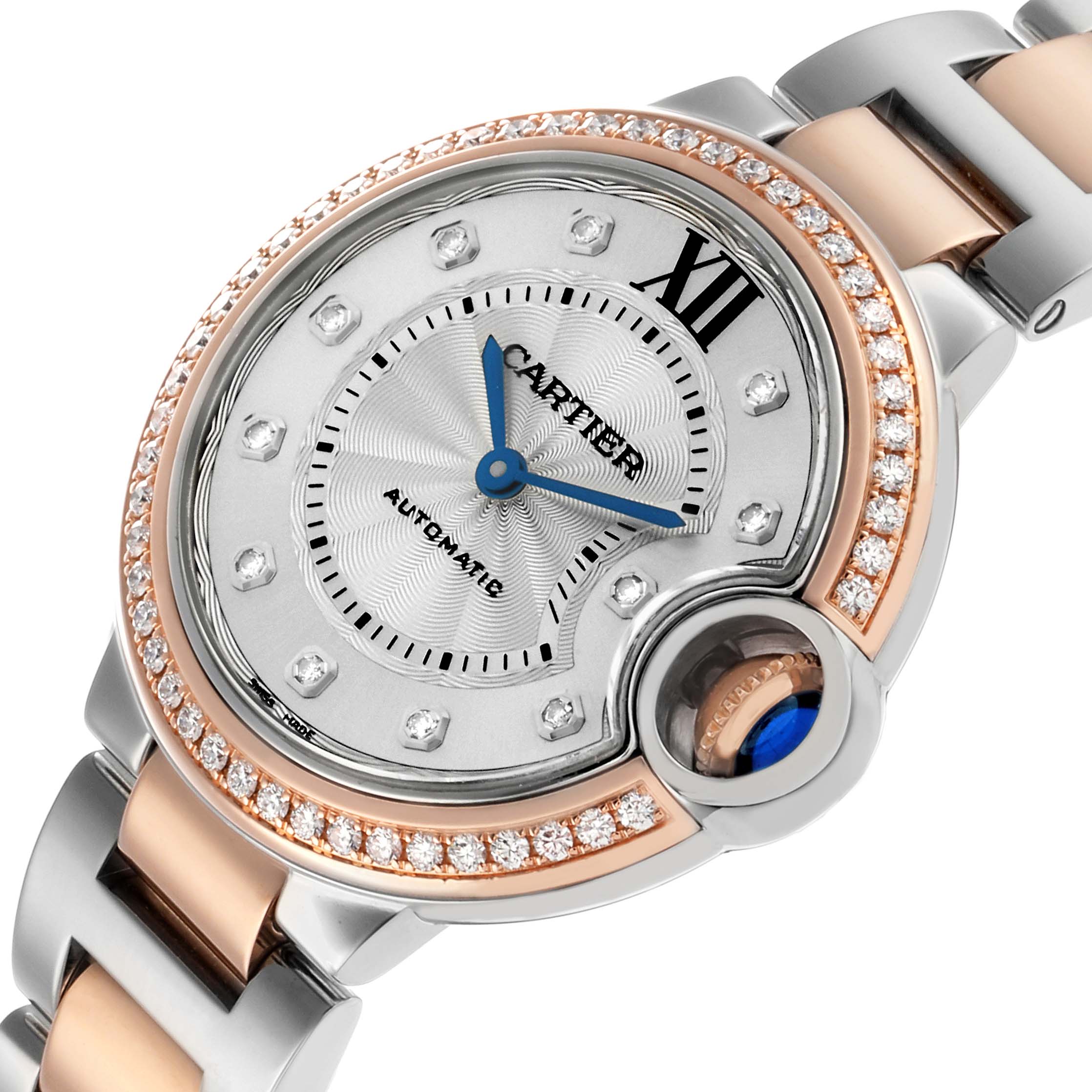 The image shows a Cartier Ballon Bleu W3BB0023 Women's Steel and Gold (two tone) Silver Dial watch at an angled view highlighting its diamond bezel, silver dial, blue hands, and two-tone bracelet.