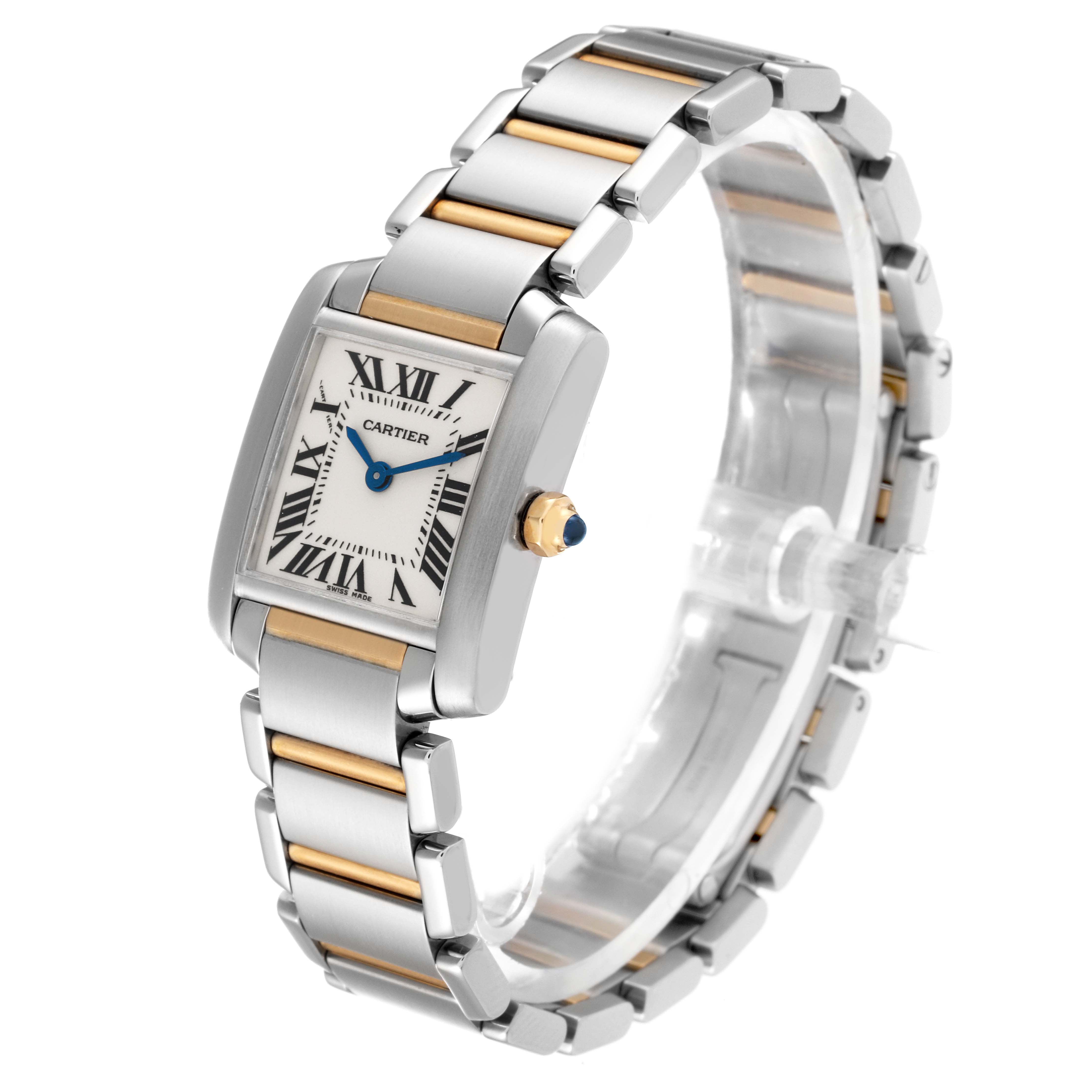 The Cartier Tank Française watch is shown at a three-quarter angle, highlighting its square dial, silver and gold bracelet, and blue cabochon crown.