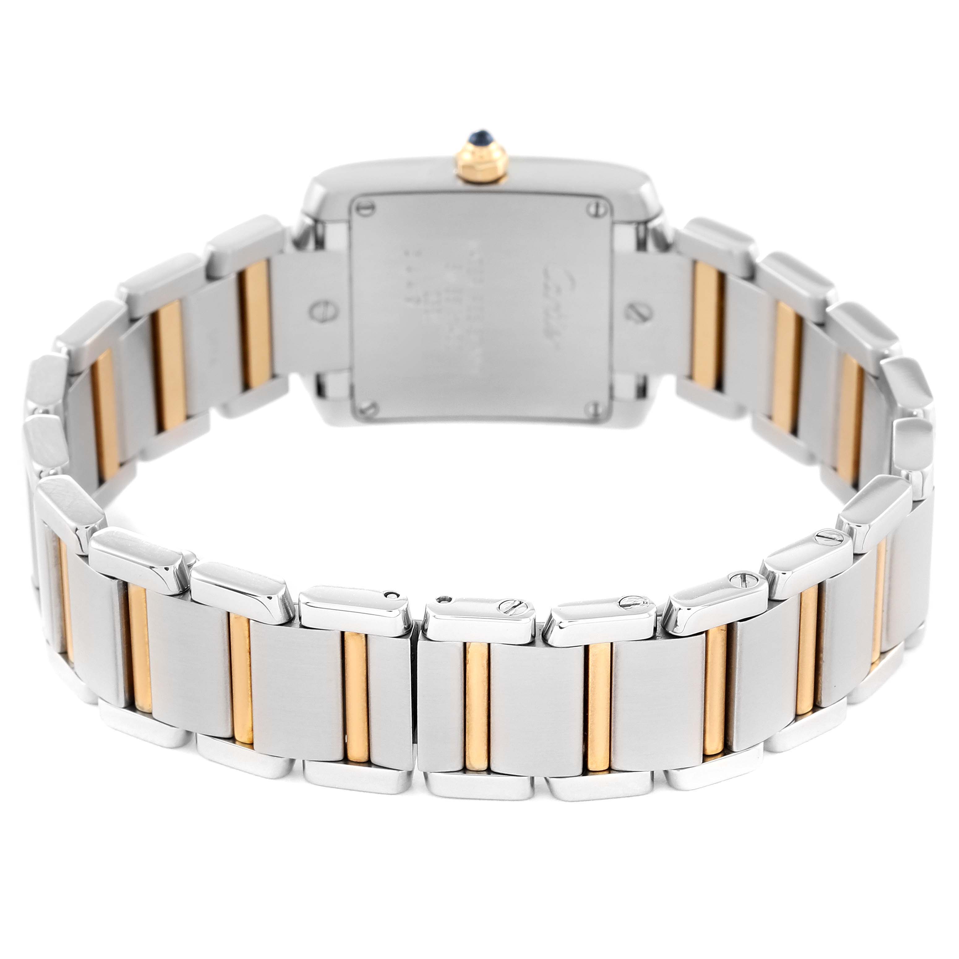 The image shows the back view of a Cartier Tank Francaise W51007Q4 Women
s Steel and Gold (two tone) Silver Dial W51007Q4 Women
s Steel and Gold (two tone) Silver Dial watch, highlighting the stainless steel and gold bracelet links.