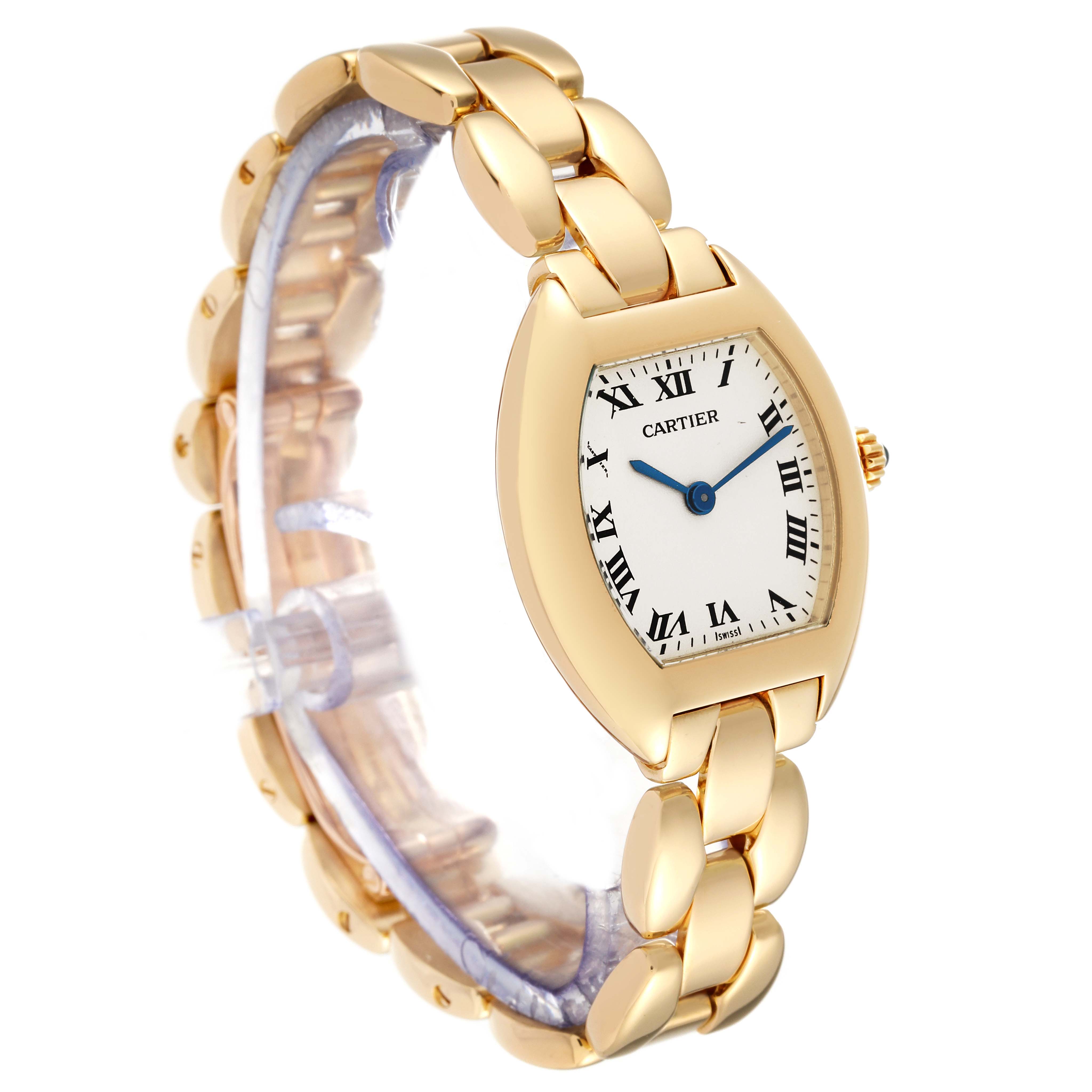 The Cartier Tonneau W15174P4 Women's Yellow Gold Silver Dial W15174P4 Women's Yellow Gold Silver Dial watch is shown at a three-quarter angle, displaying the dial, bracelet, and case.