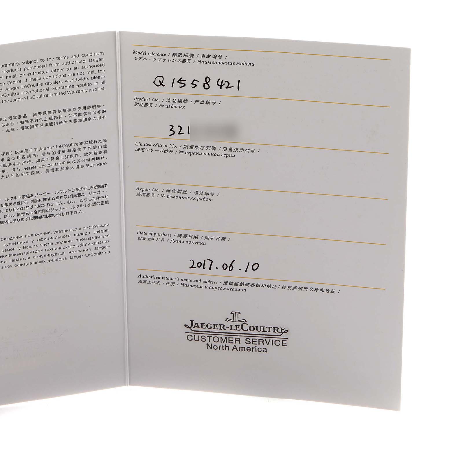 The image shows the warranty card of a Jaeger LeCoultre Master Q1558421 Men's Stainless Steel Silver Dial model at a slight angle, displaying model and purchase details.