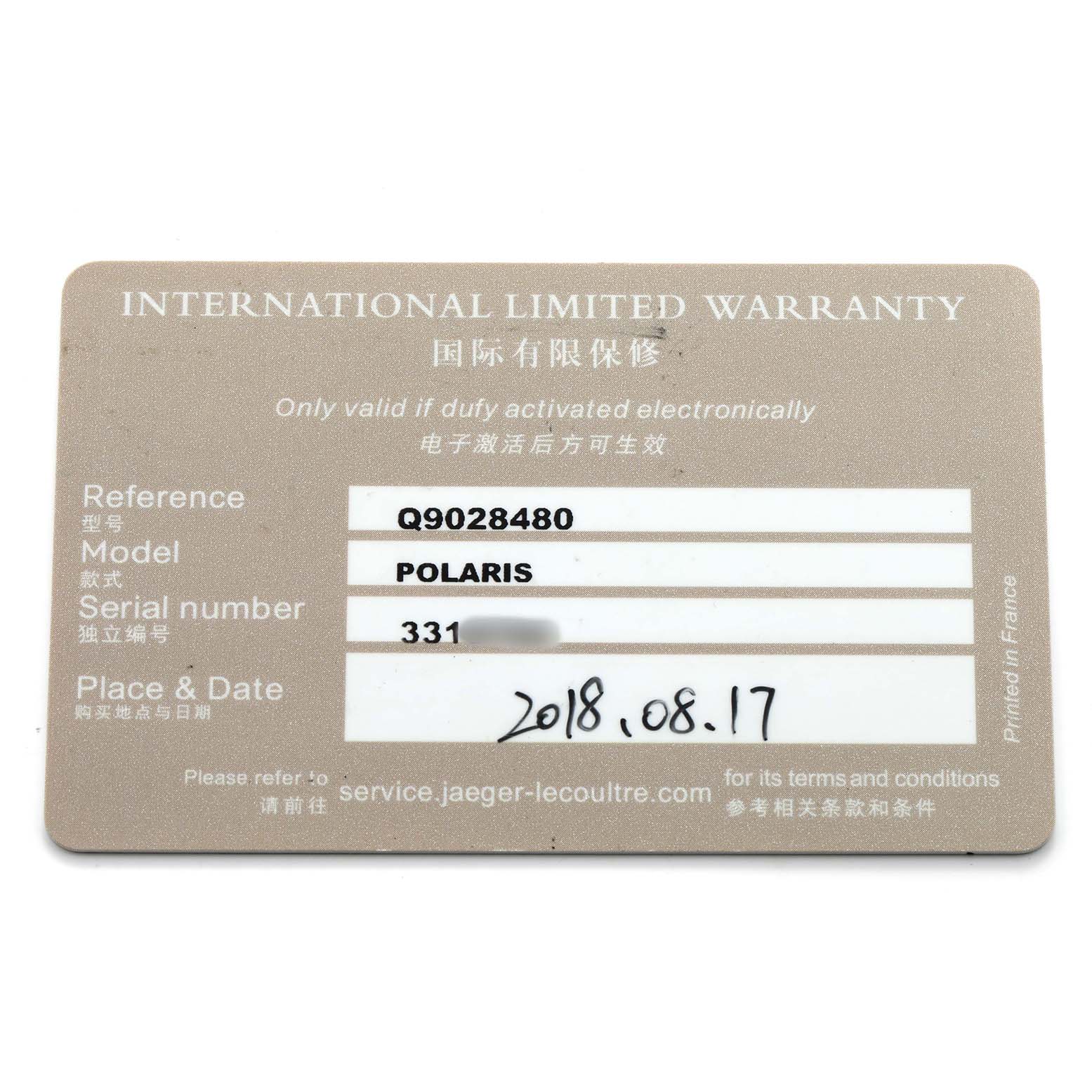 The image shows an International Limited Warranty card for the Jaeger LeCoultre Polaris Q9028480 Men's Stainless Steel Blue Dial watch, featuring model, serial, and date details.