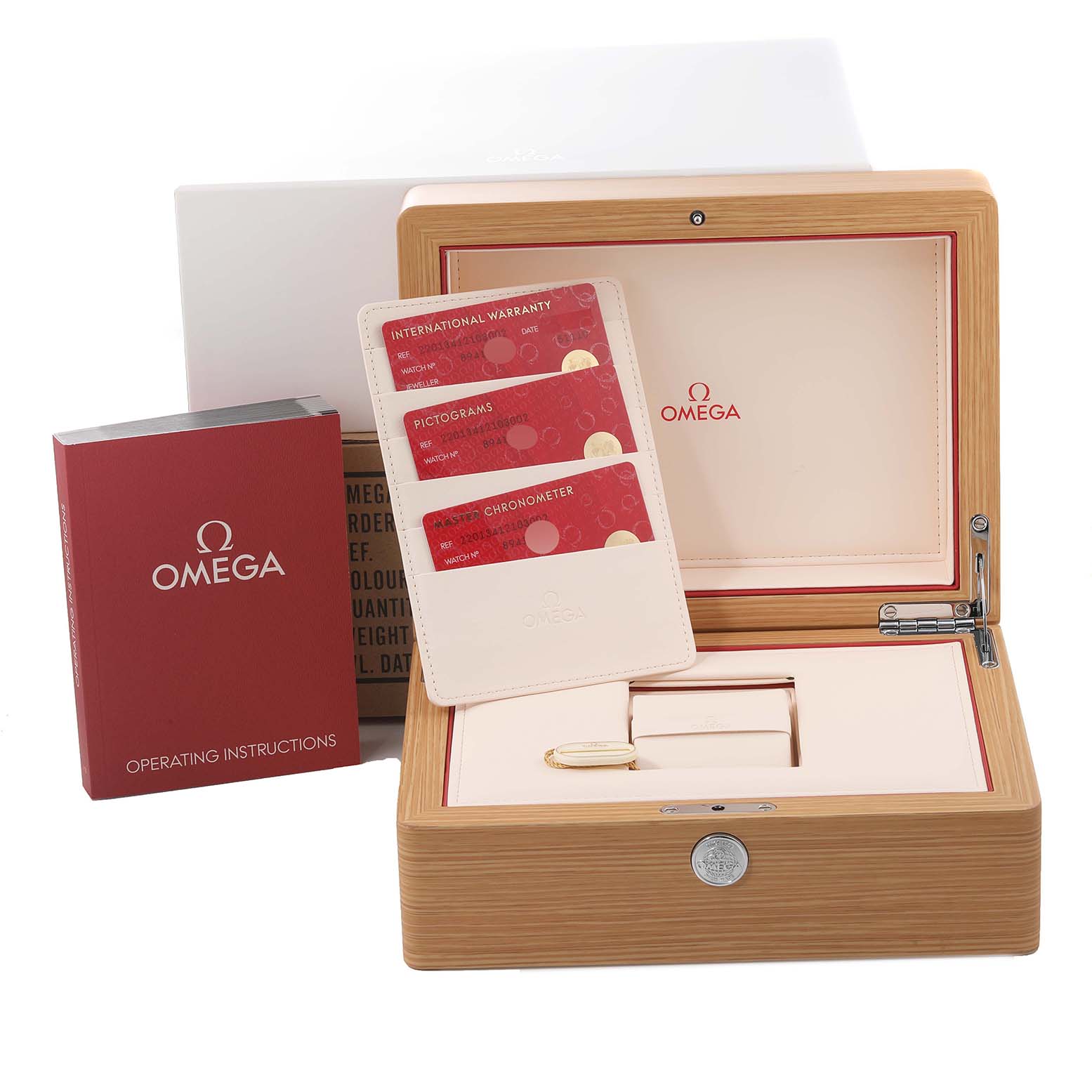 This image shows the packaging and accessories of an Omega Aqua Terra 220.13.41.21.03.002 Men
s Stainless Steel Blue Dial 220.13.41.21.03.002 Men
s Stainless Steel Blue Dial model, including the box, manuals, and warranty cards.