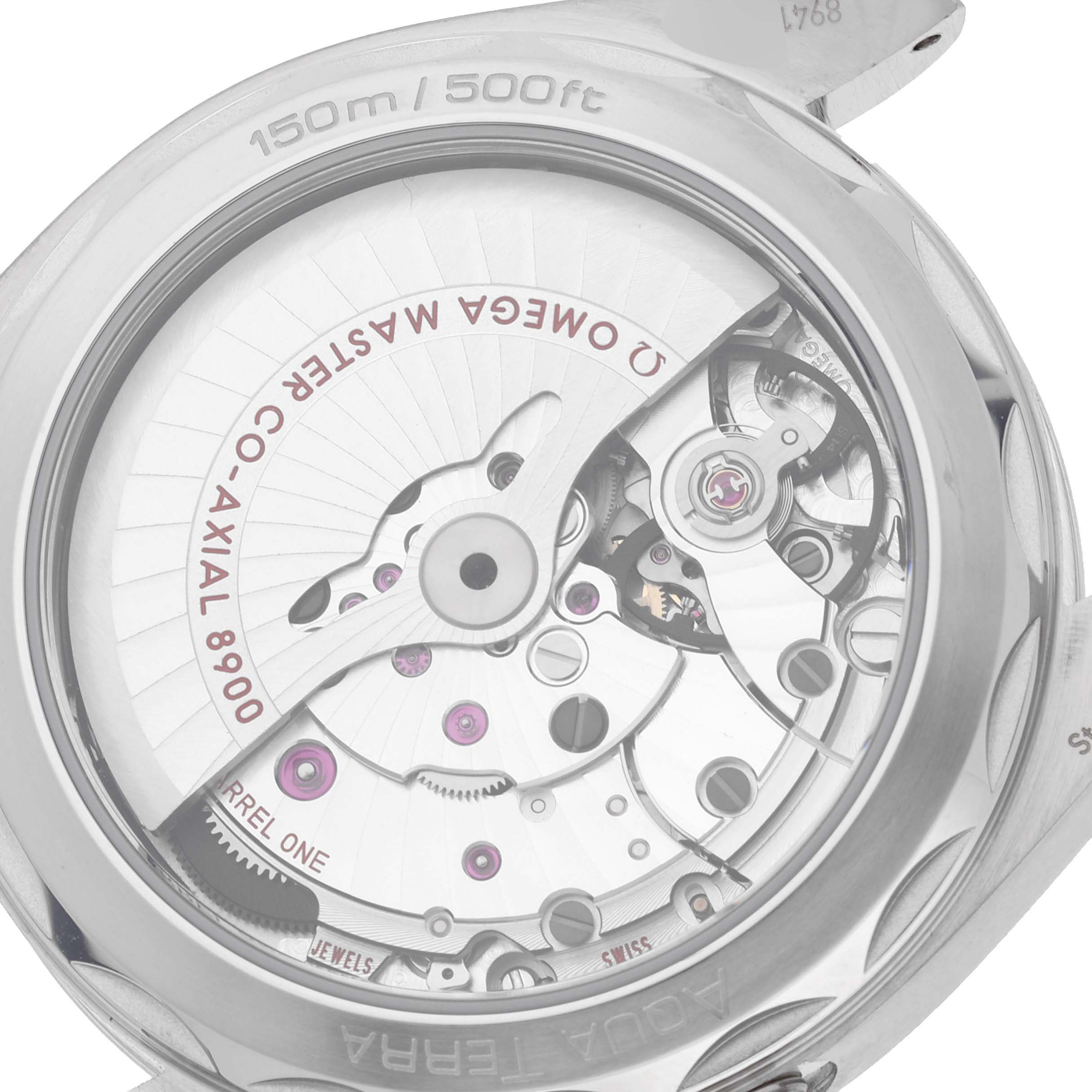 The image shows a close-up, rear view of the movement inside an Omega Aqua Terra 220.13.41.21.03.002 Men
s Stainless Steel Blue Dial 220.13.41.21.03.002 Men
s Stainless Steel Blue Dial watch, revealing its intricate mechanics.