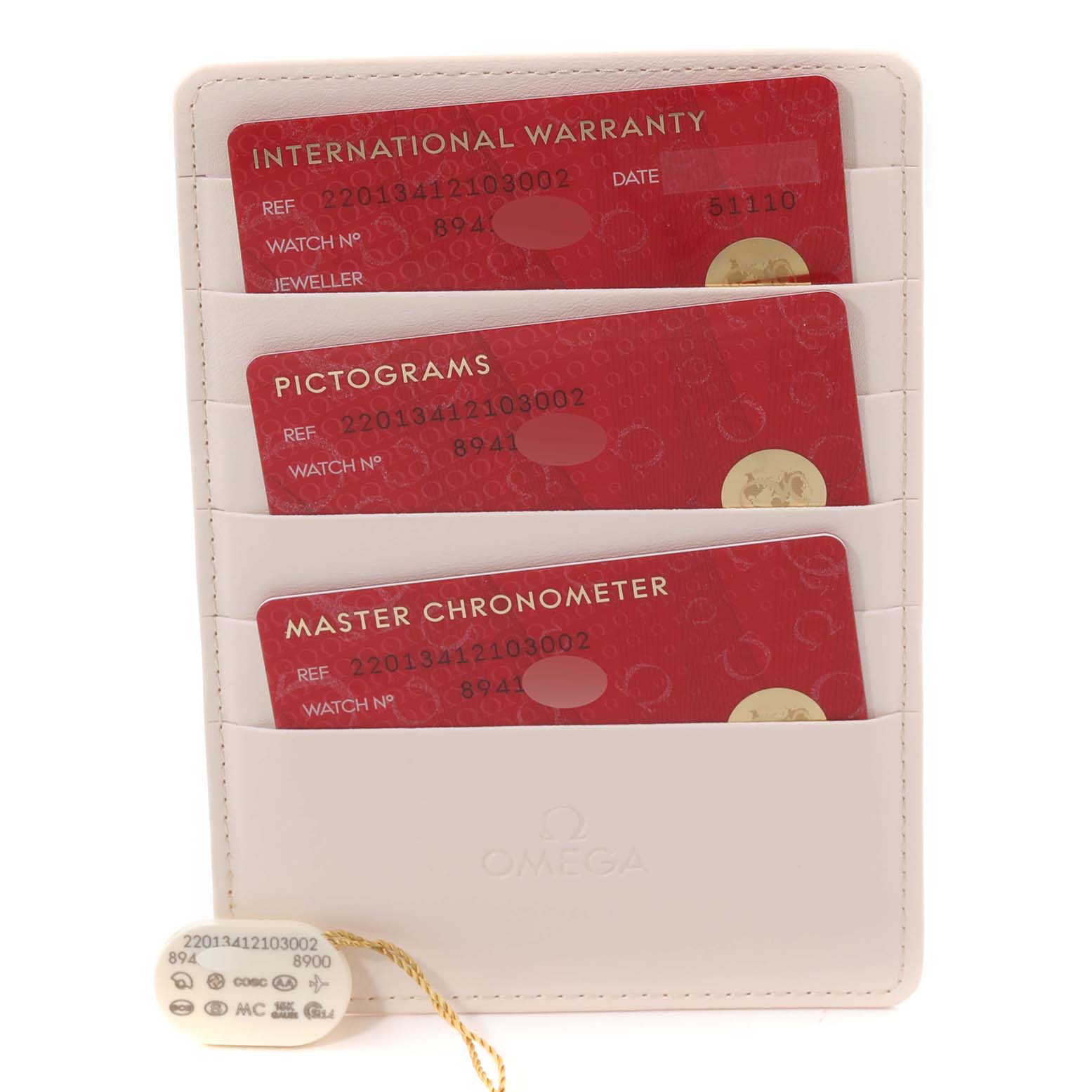 This image shows the warranty cards and a tag for the Omega Aqua Terra 220.13.41.21.03.002 Men
s Stainless Steel Blue Dial 220.13.41.21.03.002 Men
s Stainless Steel Blue Dial watch, displayed in a cardholder.