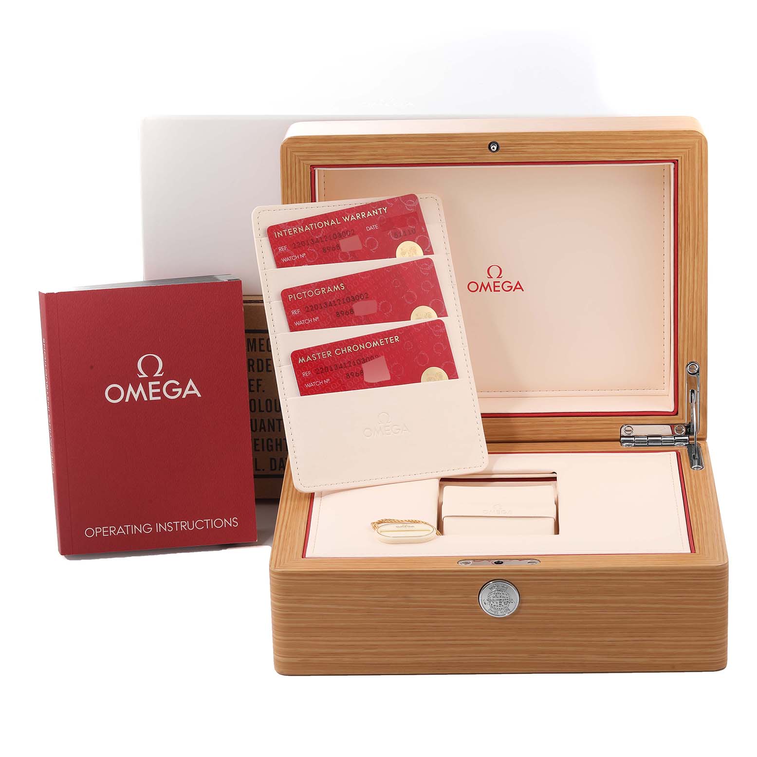 The image shows the packaging and accessories for an Omega Aqua Terra 220.13.41.21.03.002 Men
s Stainless Steel Blue Dial 220.13.41.21.03.002 Men
s Stainless Steel Blue Dial watch, including a wooden box, warranty cards, and an operating manual.