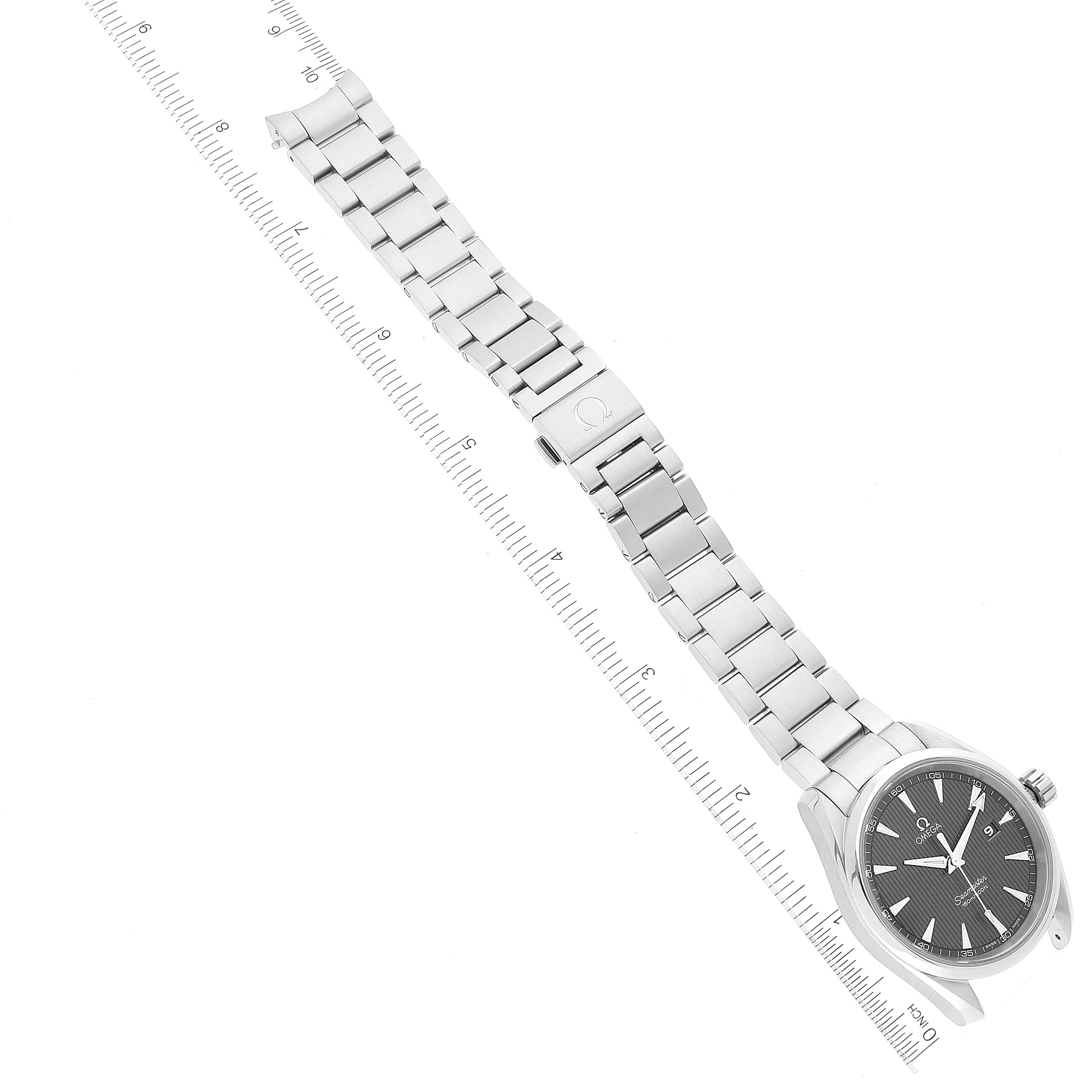 The image shows an Omega Aqua Terra 231.10.39.60.06.001 Men's Stainless Steel Grey Dial 231.10.39.60.06.001 Men's Stainless Steel Grey Dial watch laid flat with its bracelet, clasp, and face visible, placed next to a measuring ruler.