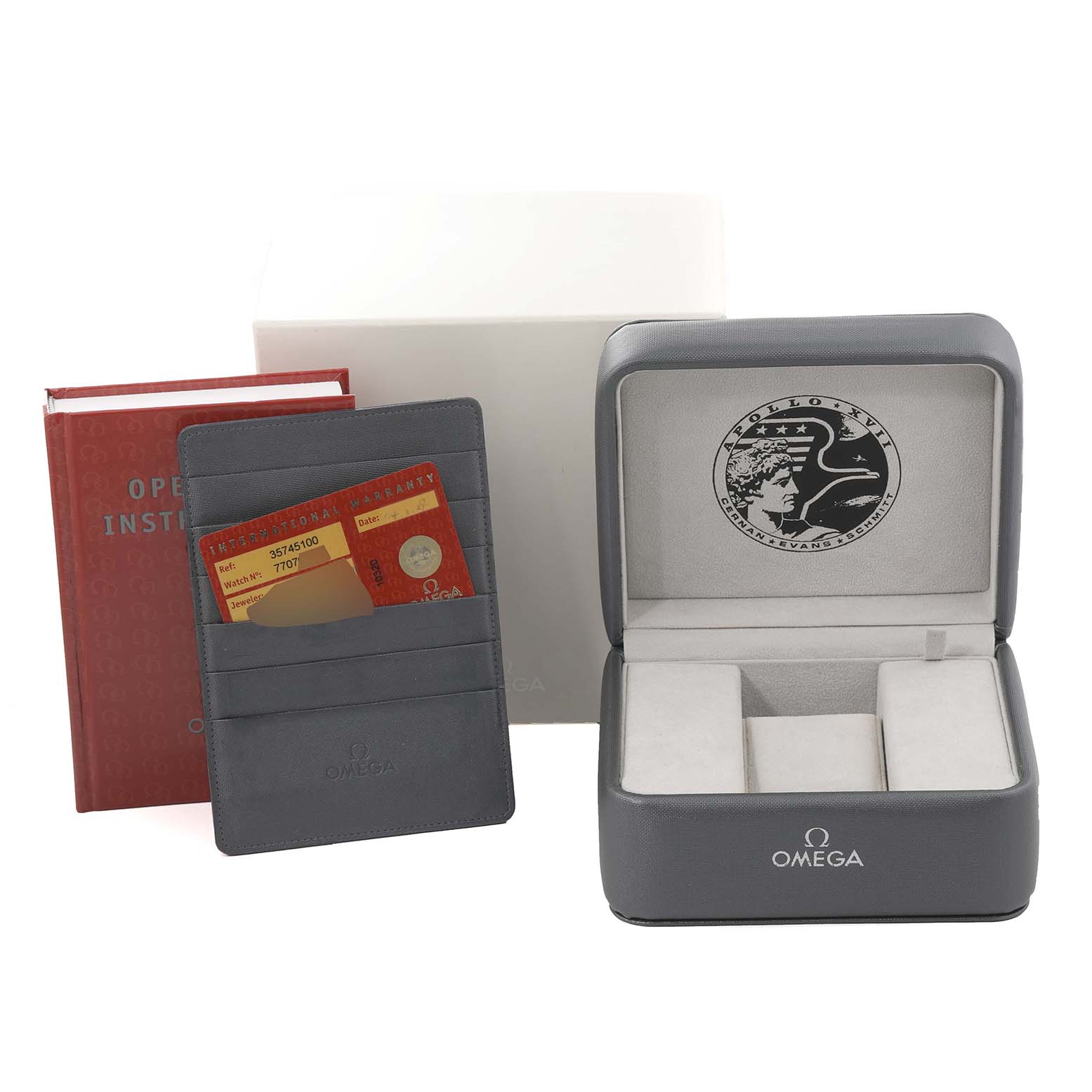 The image shows the packaging, warranty cardholder, and manual of an Omega Speedmaster 3574.51.00 Men's Stainless Steel Black Dial 3574.51.00 Men's Stainless Steel Black Dial watch.