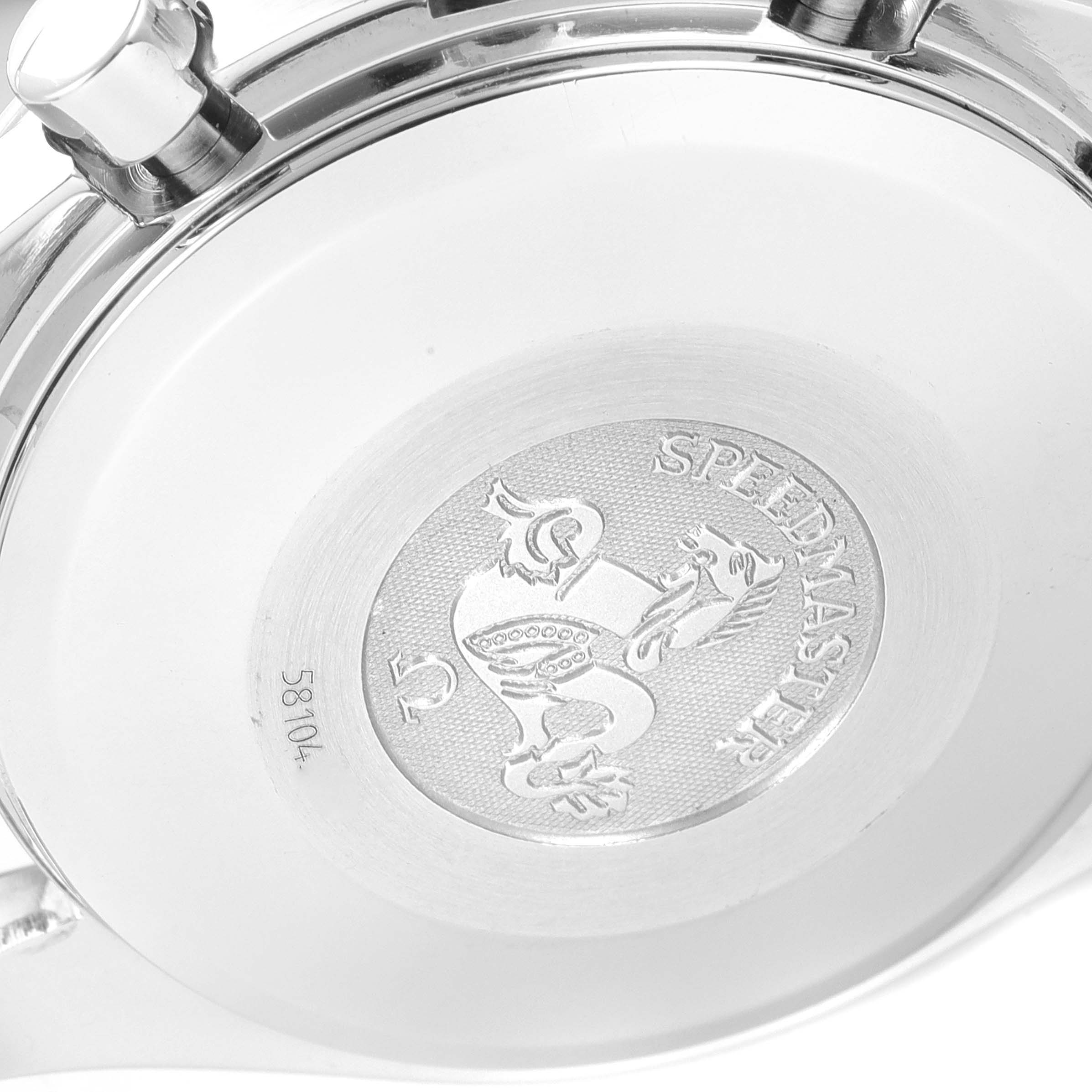 The image shows the engraved case back of an Omega Speedmaster 3513.52.00 Men
s Stainless Steel Black Dial 3513.52.00 Men
s Stainless Steel Black Dial watch viewed from the rear angle.