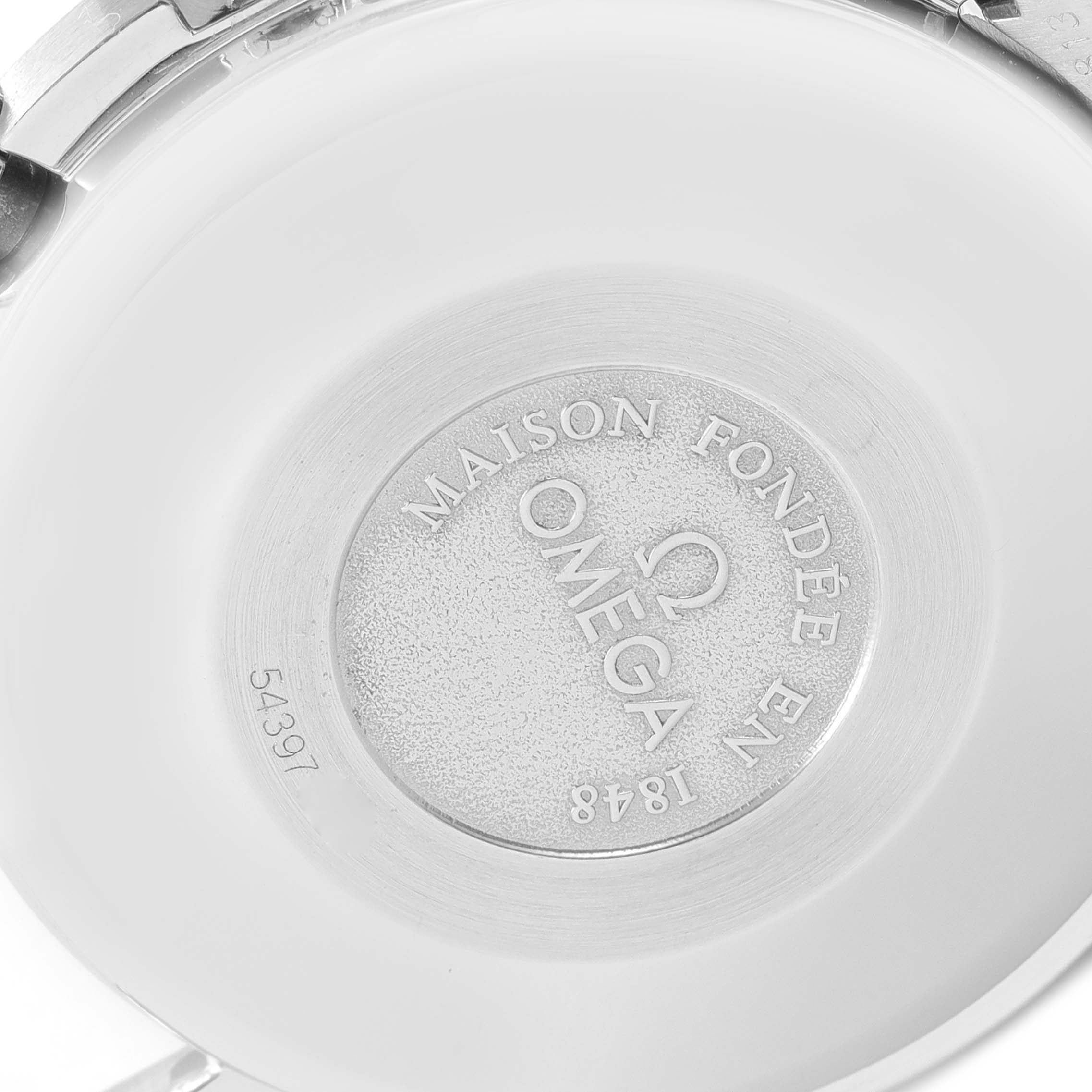 The image shows the case back of an Omega Speedmaster 3521.30.00 Men
s Stainless Steel Silver Dial 3521.30.00 Men
s Stainless Steel Silver Dial watch, featuring the brand
s logo and engravings.