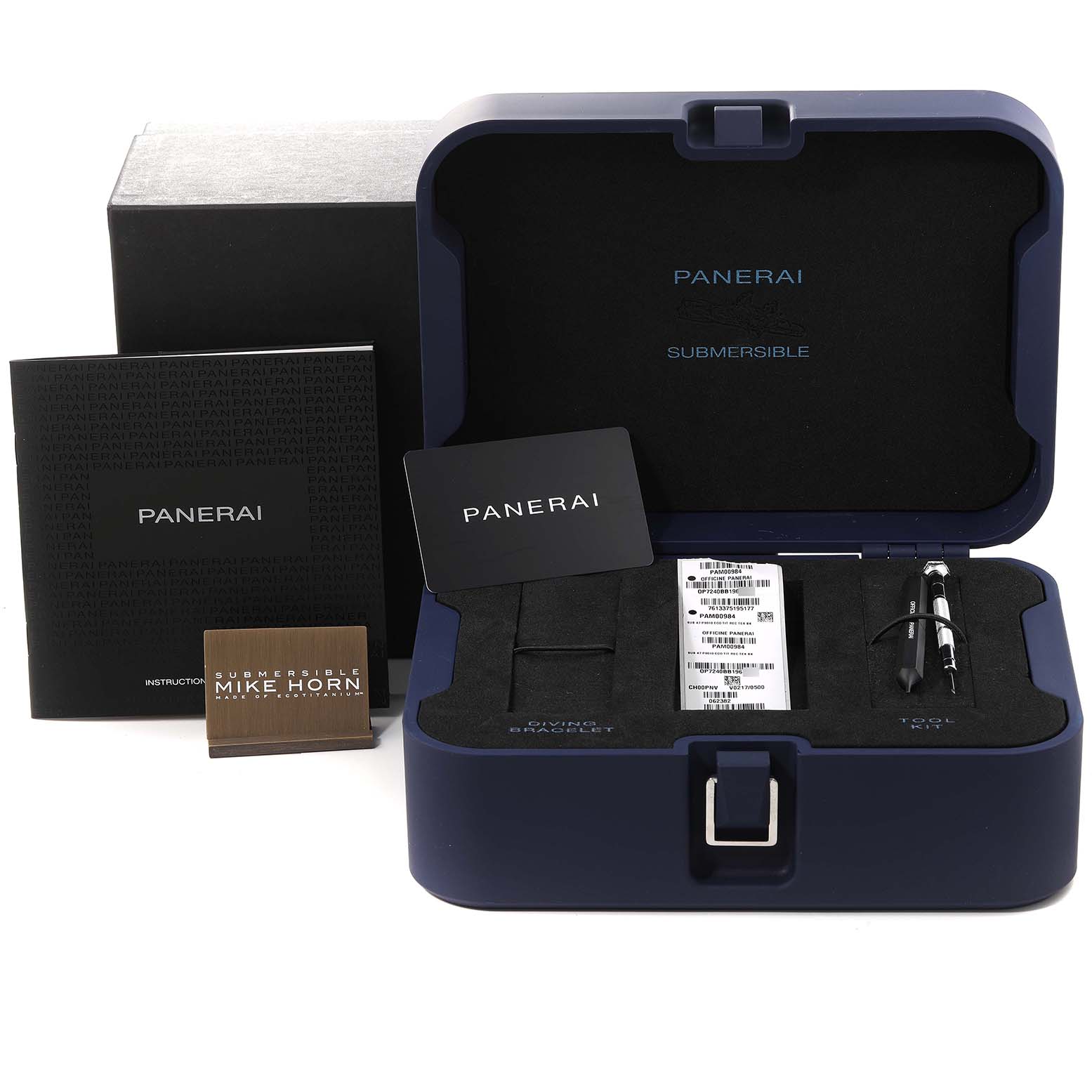 The image shows the open box of Panerai Submersible PAM00984 Men's Titanium Black Dial PAM00984 Men's Titanium Black Dial, alongside manuals and accessories.