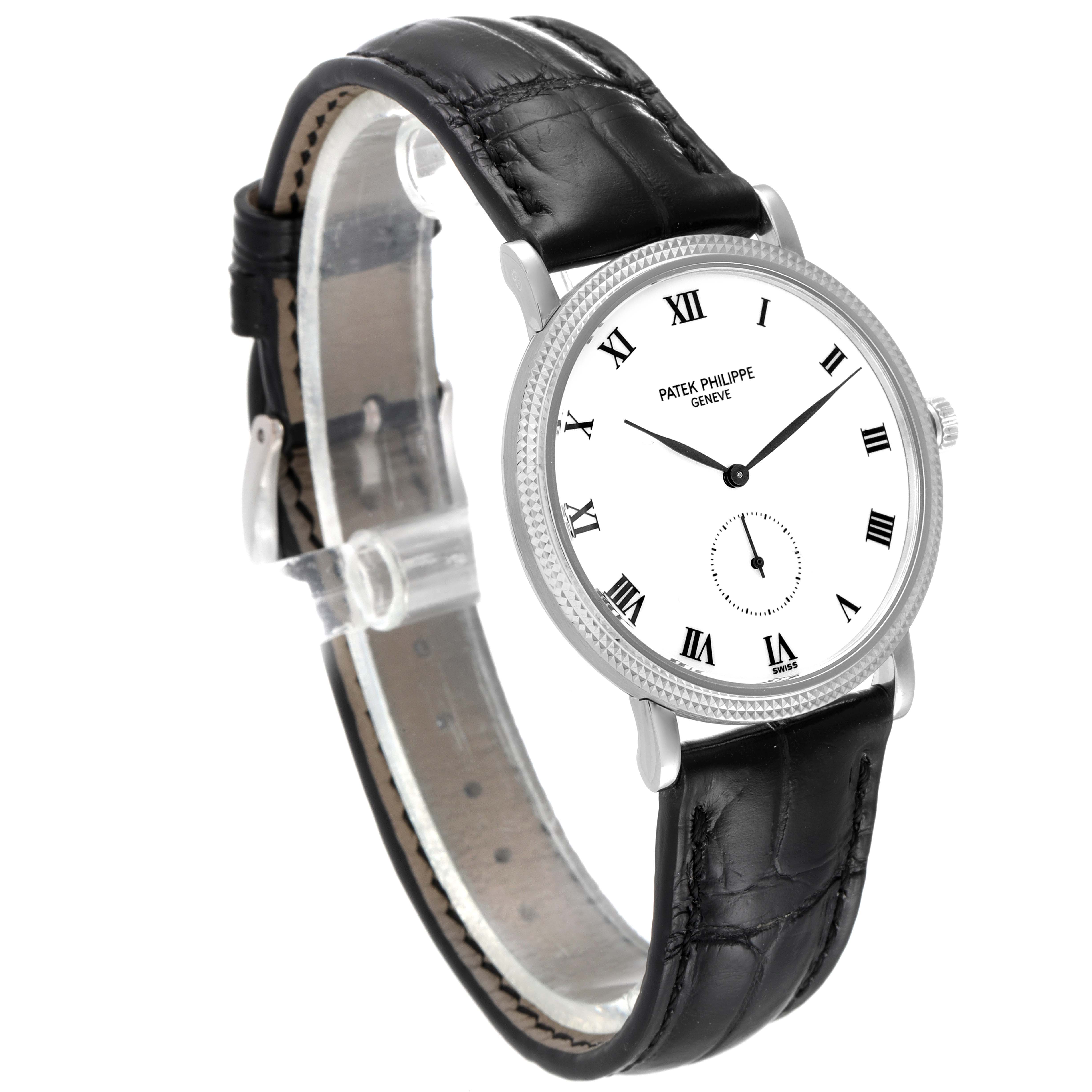 The Patek Philippe Calatrava 3919 Men's White Gold White Dial 3919 Men's White Gold White Dial watch is shown at a three-quarter angle, displaying its face, bezel, and black leather strap.