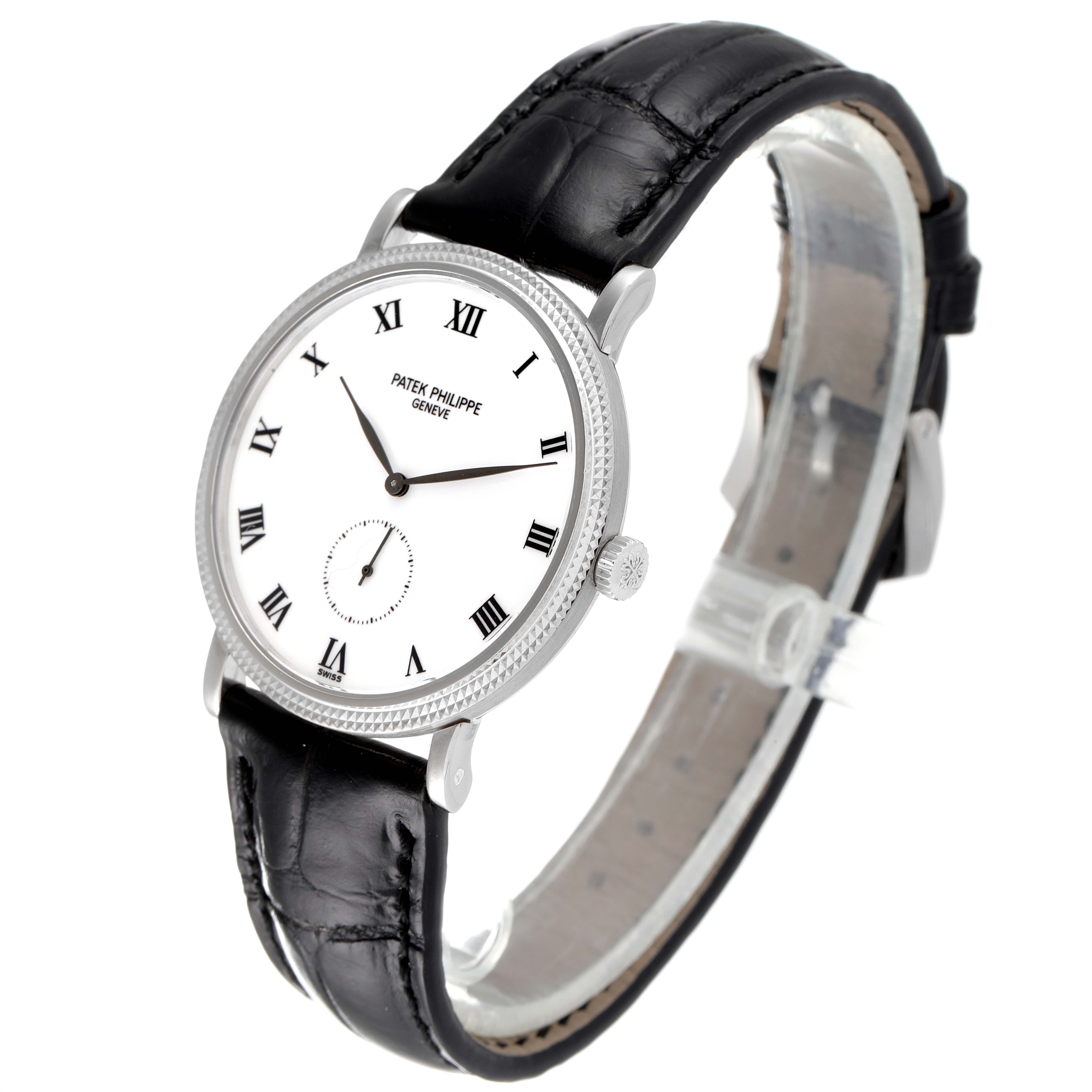 The image shows a Patek Philippe Calatrava 3919 Men's White Gold White Dial 3919 Men's White Gold White Dial watch at an angle highlighting its face, side, and leather strap.