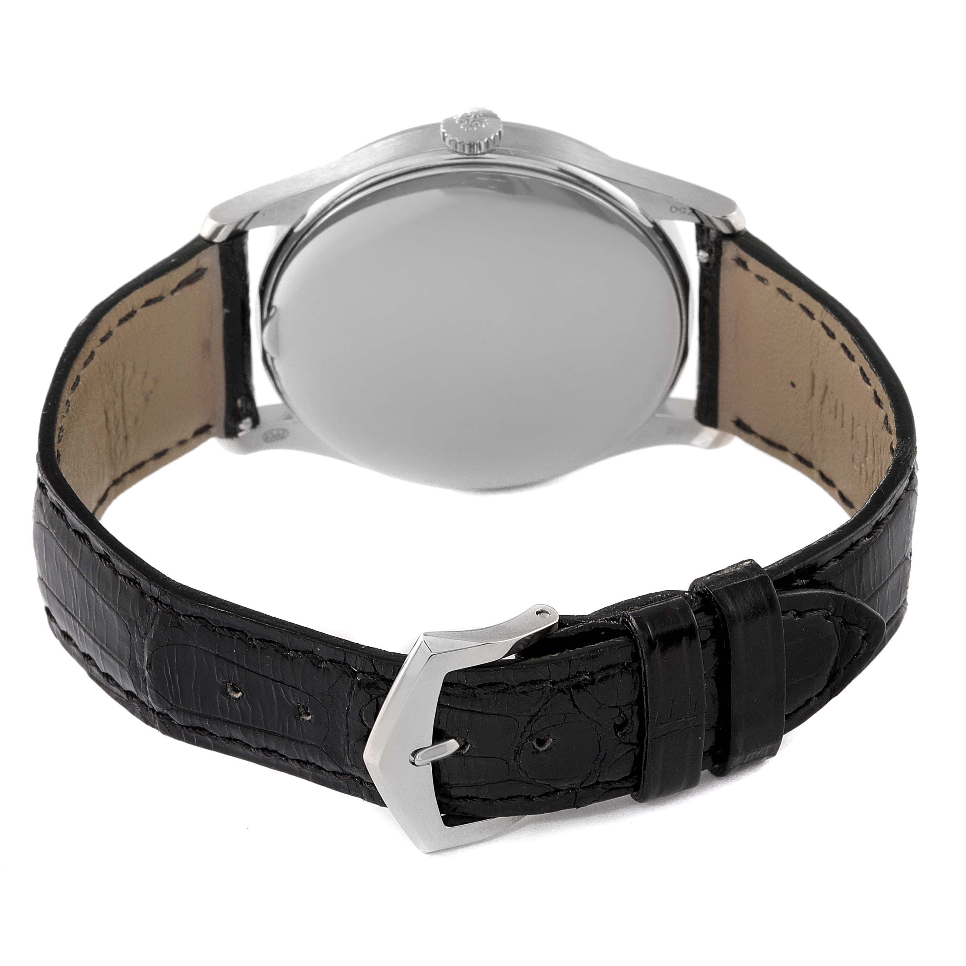 The image shows the back view of a Patek Philippe Calatrava 5196G Men's White Gold Silver Dial 5196G Men's White Gold Silver Dial watch, including the case, crown, and black leather strap with buckle.