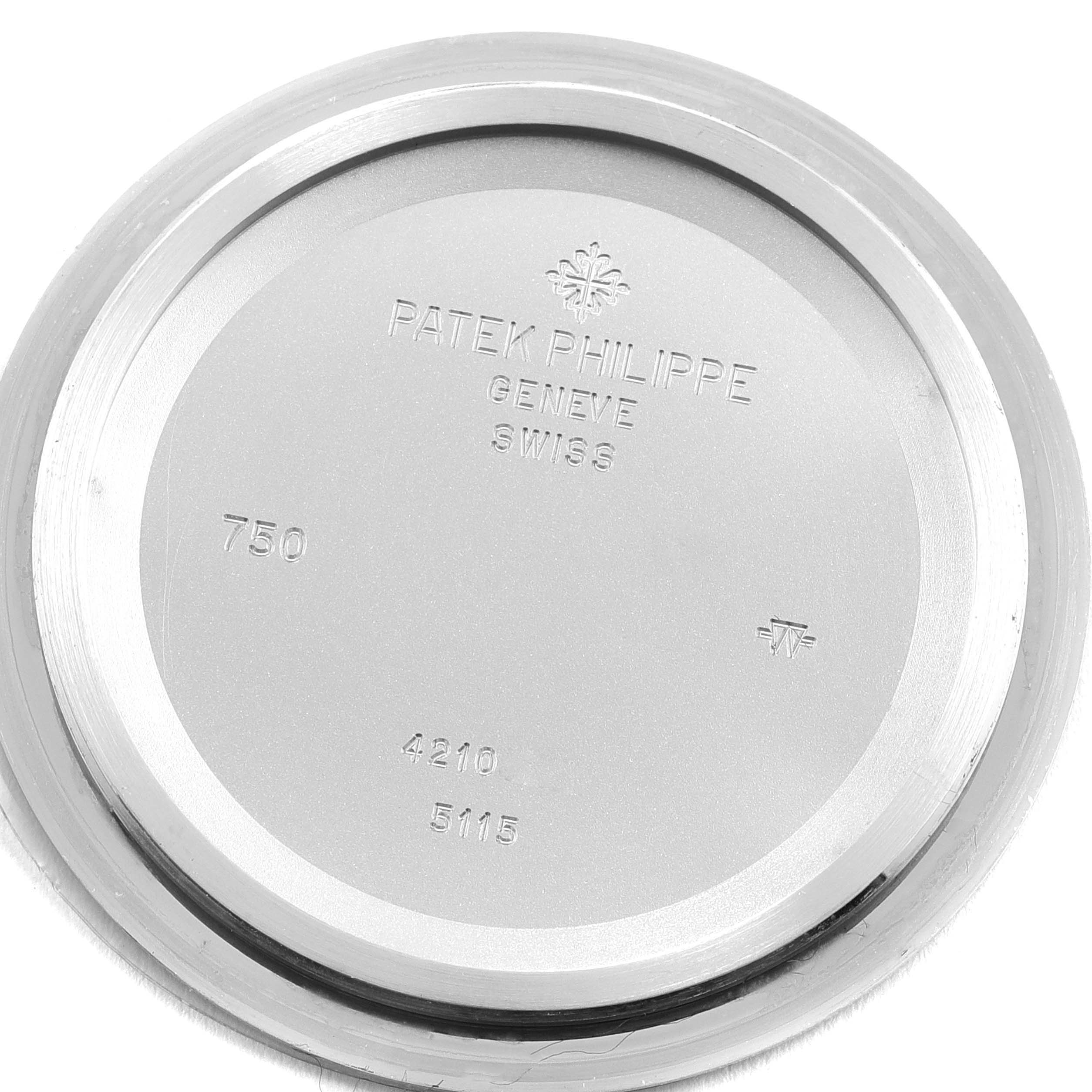 The image shows the back casing of a Patek Philippe Calatrava 5115G Men's White Gold White Dial 5115G Men's White Gold White Dial watch, featuring brand engravings.