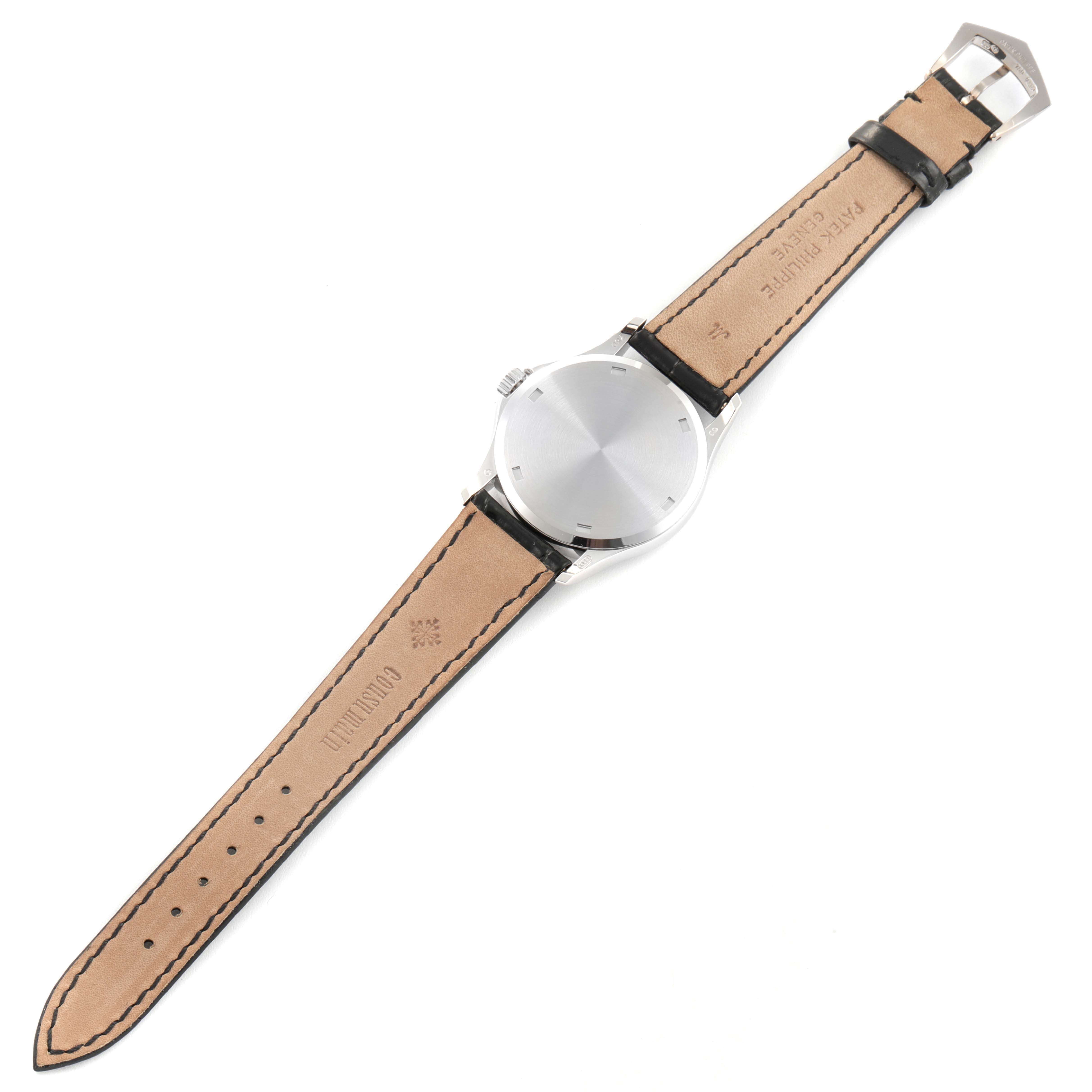 The image shows the back view of a Patek Philippe Calatrava 5115G Men's White Gold White Dial 5115G Men's White Gold White Dial watch, displaying its leather strap and clasp.