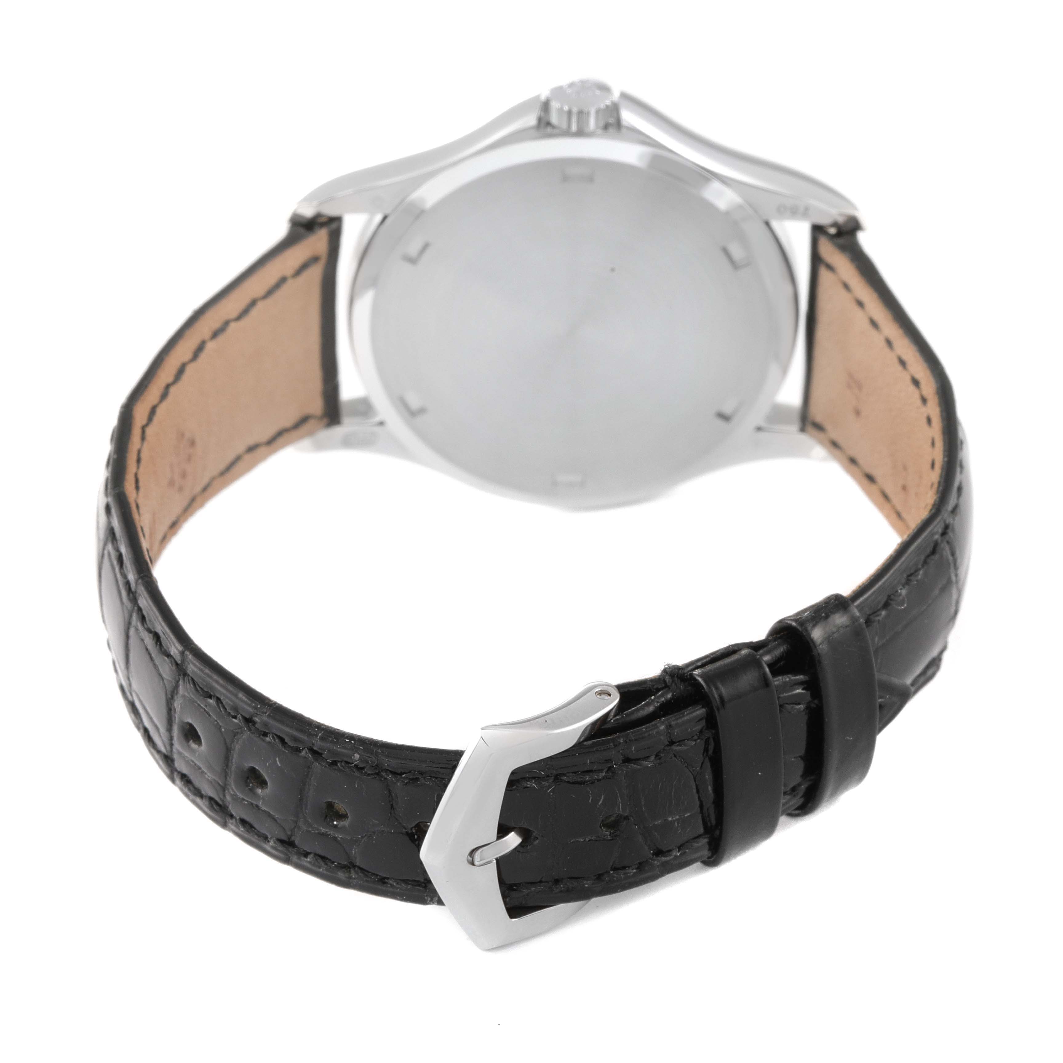 The image shows a rear view of a Patek Philippe Calatrava 5115G Men's White Gold White Dial 5115G Men's White Gold White Dial watch, highlighting its black leather strap and metal clasp.