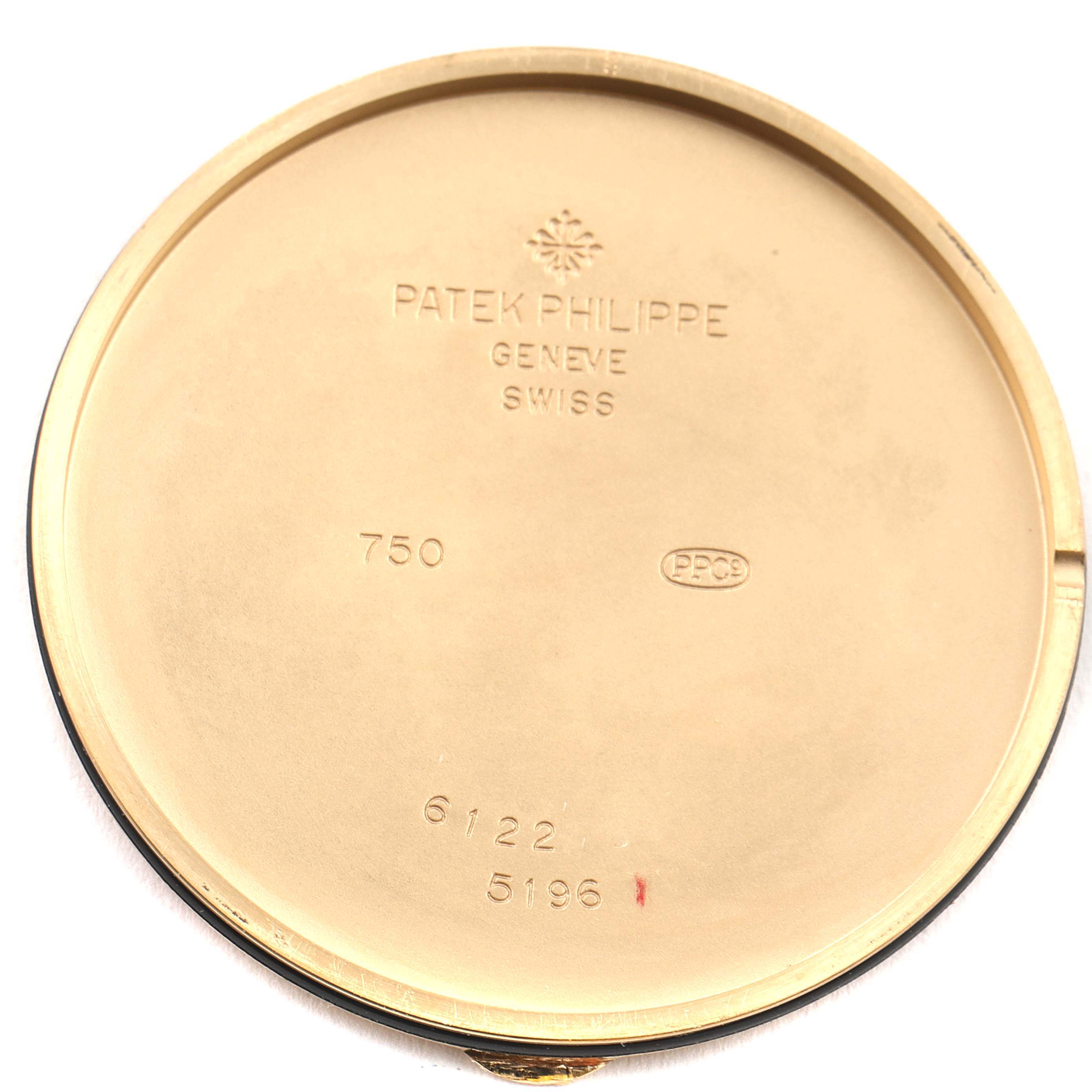 The image shows the inside case back of a Patek Philippe Calatrava 5196J Men's Yellow Gold Silver Dial 5196J Men's Yellow Gold Silver Dial watch model.
