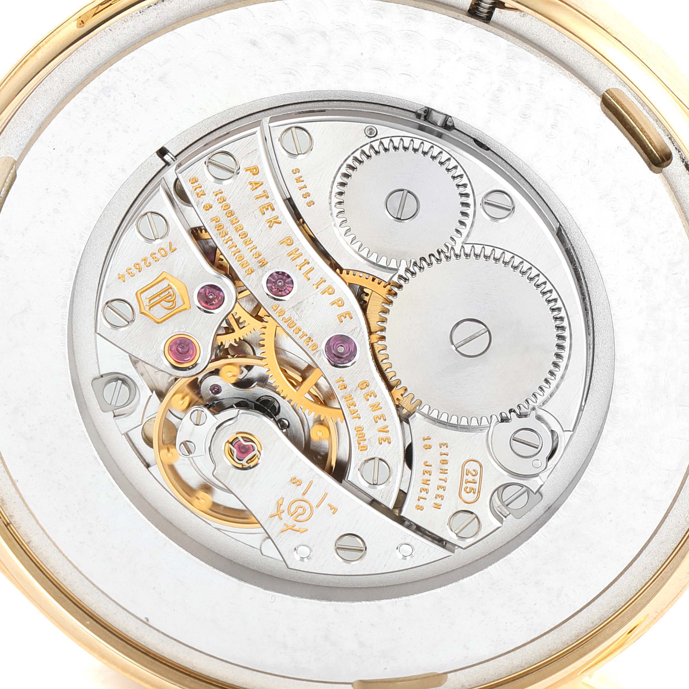 This image shows the inner mechanical movement of a Patek Philippe Calatrava 5196J Men's Yellow Gold Silver Dial 5196J Men's Yellow Gold Silver Dial watch from the back.