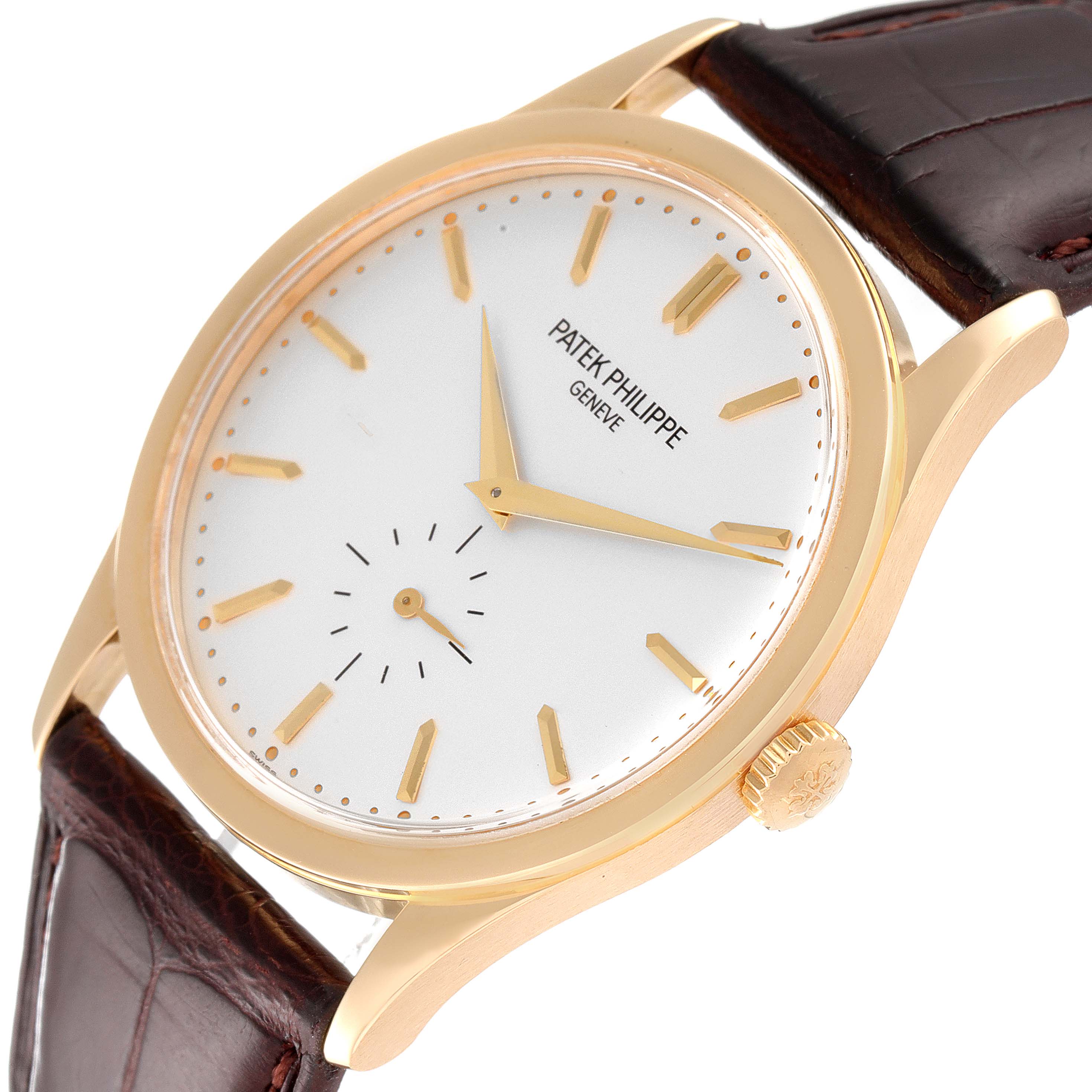 The image shows a Patek Philippe Calatrava 5196J Men's Yellow Gold Silver Dial 5196J Men's Yellow Gold Silver Dial watch angled from the right side, focusing on its face, dial, and crown.
