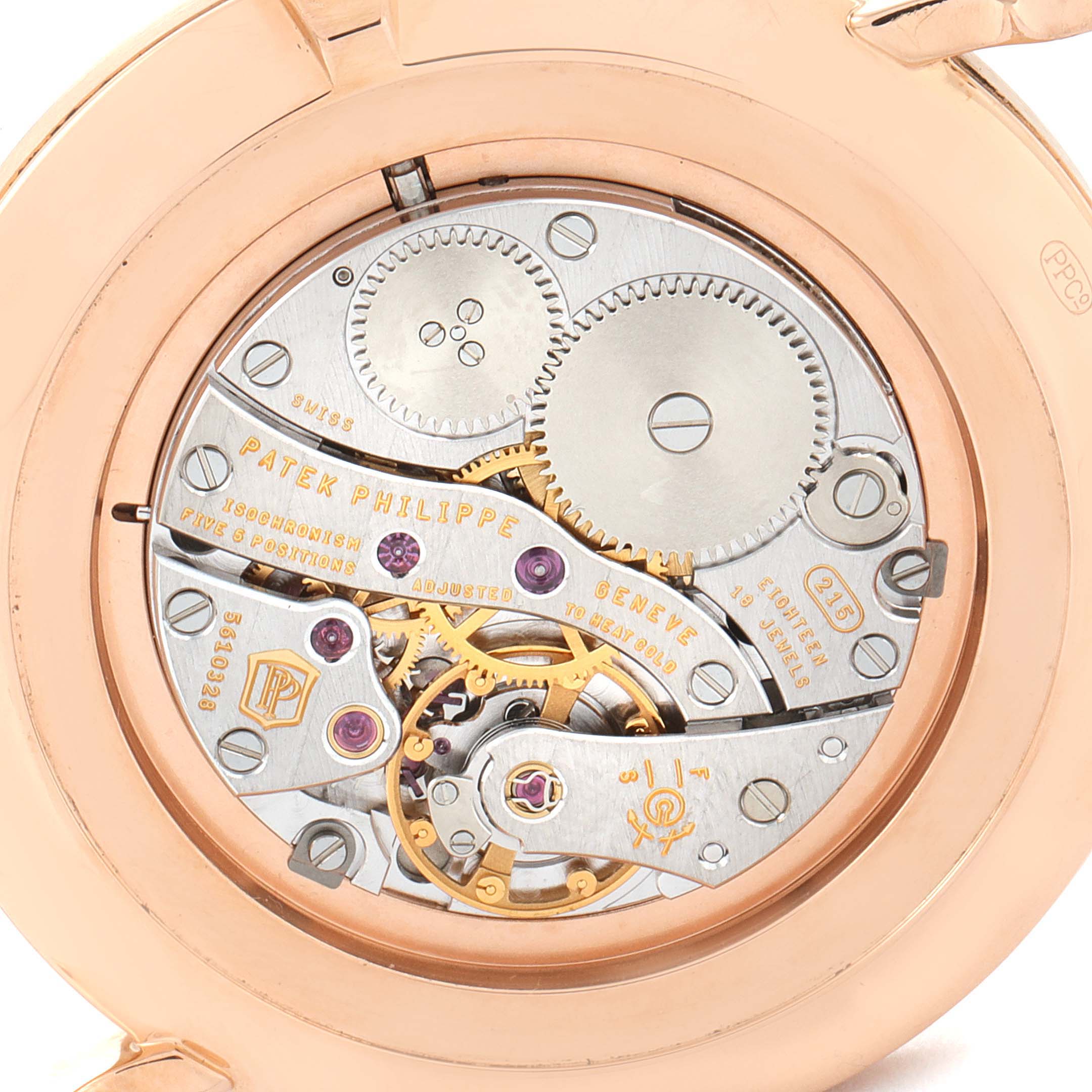 This image shows the intricate inner workings and movement mechanism of a Patek Philippe Calatrava 5119R Men's Rose Gold White Dial 5119R Men's Rose Gold White Dial watch from the back angle.