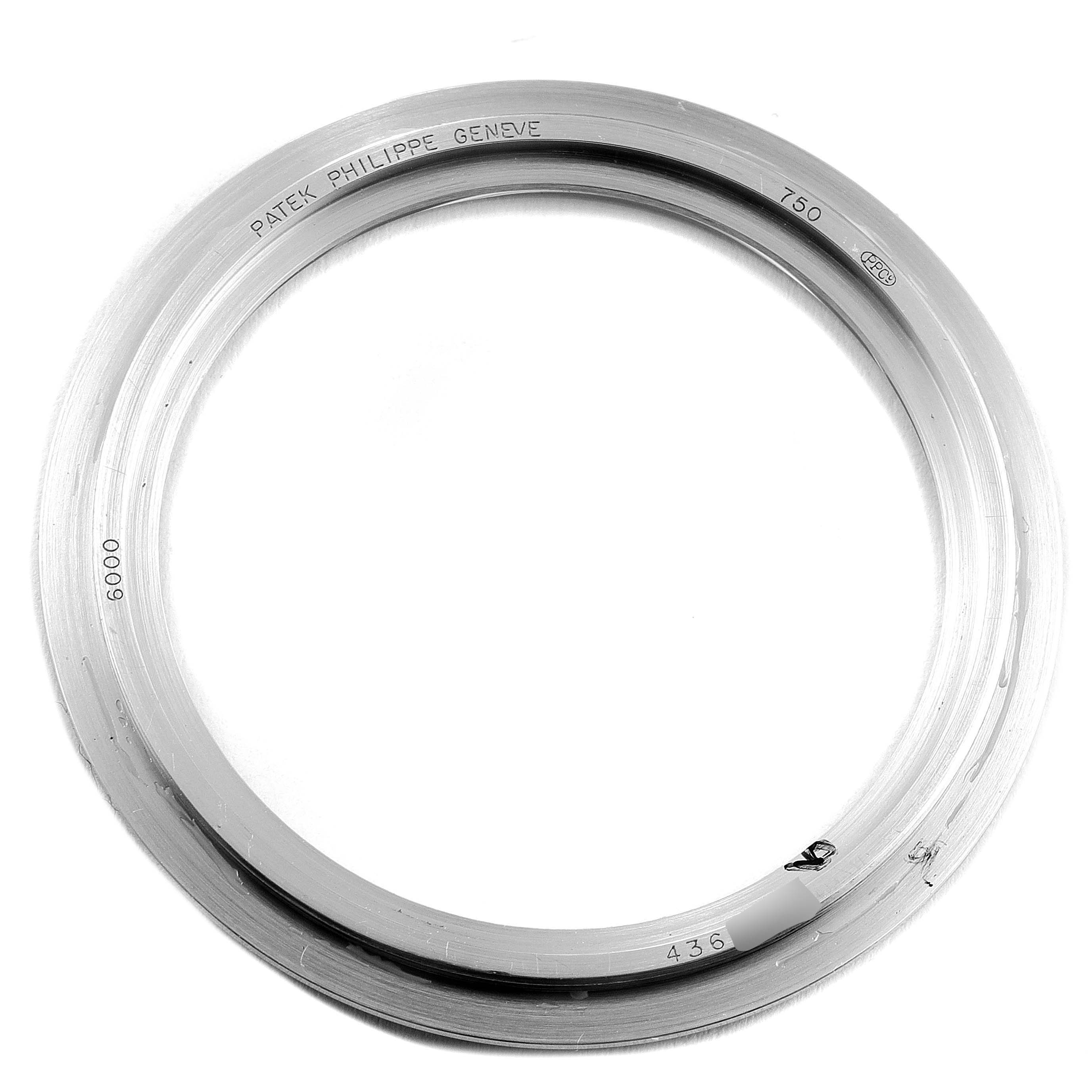 This image shows a bezel for a Patek Philippe Calatrava 6000G Men's White Gold Black Dial 6000G Men's White Gold Black Dial model, viewed from above.