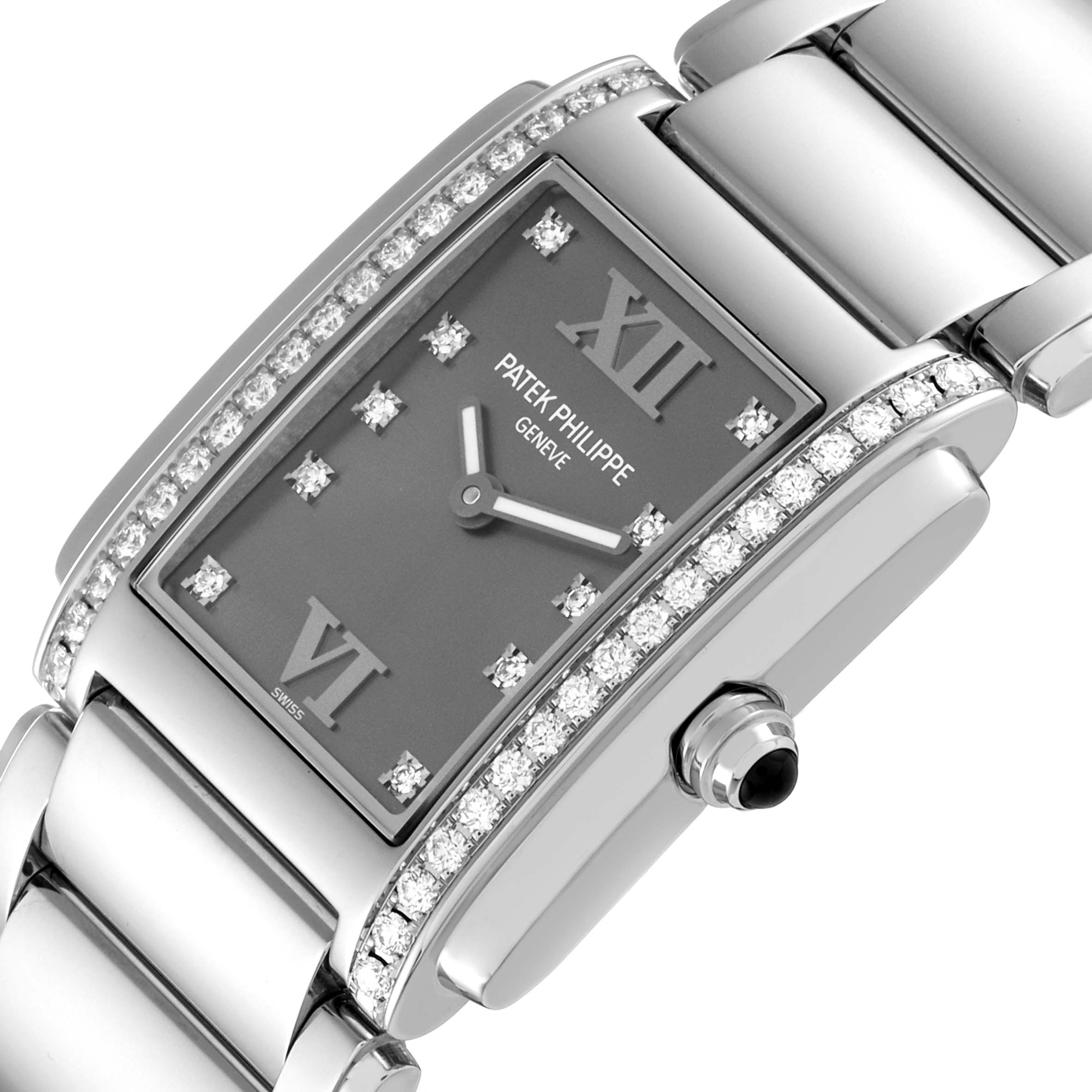 The image shows a close-up angle of the Patek Philippe Twenty-4 4910/10A Women's Stainless Steel Grey Dial 4910/10A Women's Stainless Steel Grey Dial model, highlighting its diamond-encrusted bezel and bracelet.