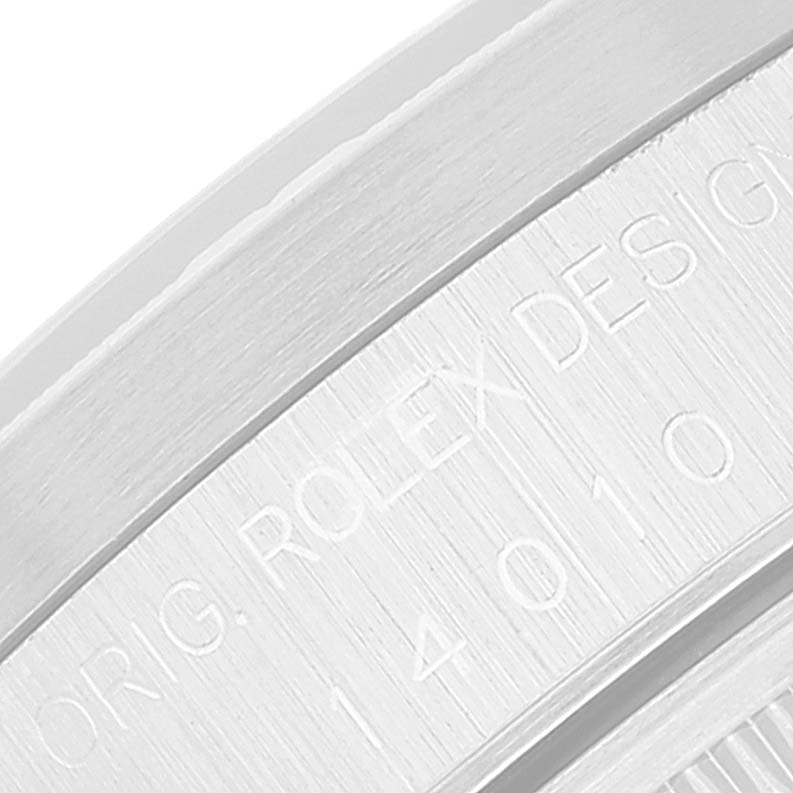 This close-up image shows the engraved bezel of a Rolex Air-King 14010 Men's Stainless Steel Black Dial 14010 Men's Stainless Steel Black Dial watch.