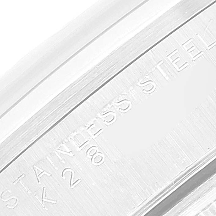 This close-up angle of the Rolex Air-King 14000 Men's Stainless Steel Blue Dial 14000 Men's Stainless Steel Blue Dial watch shows part of the stainless steel casing with engraved text.