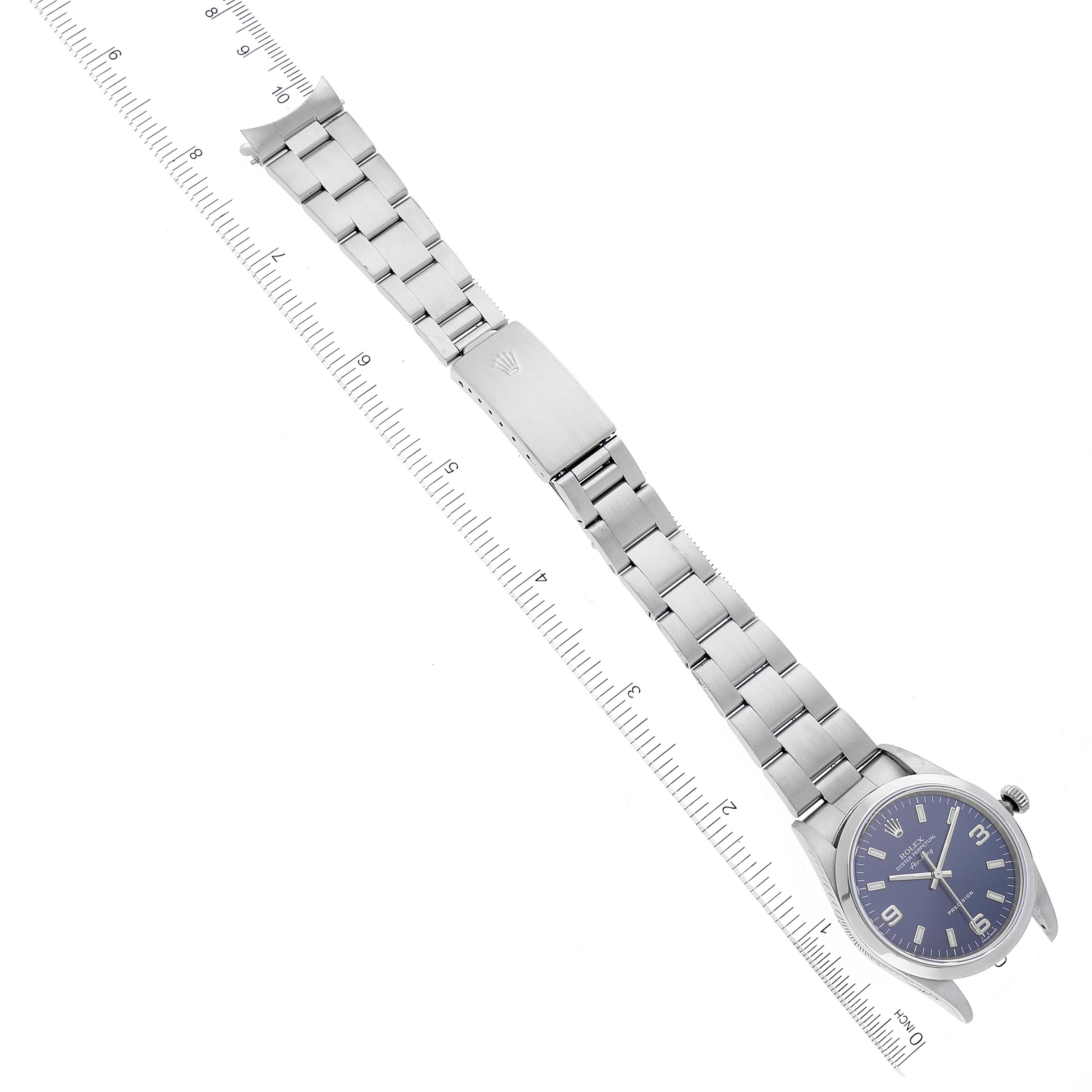 The image shows a Rolex Air-King 14000 Men's Stainless Steel Blue Dial 14000 Men's Stainless Steel Blue Dial watch with a metal bracelet, displayed flat with a ruler for measurement.