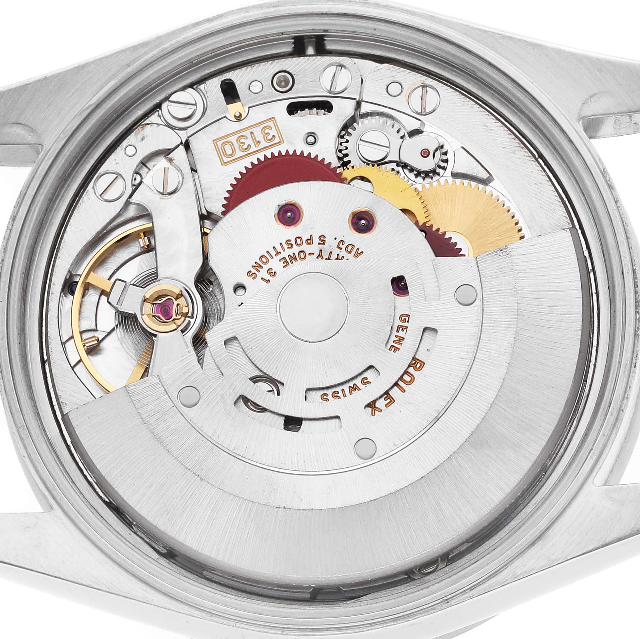 The image shows the internal movement of the Rolex Air-King 14010 Men's Stainless Steel Silver Dial watch from a top angle, highlighting gears and components.