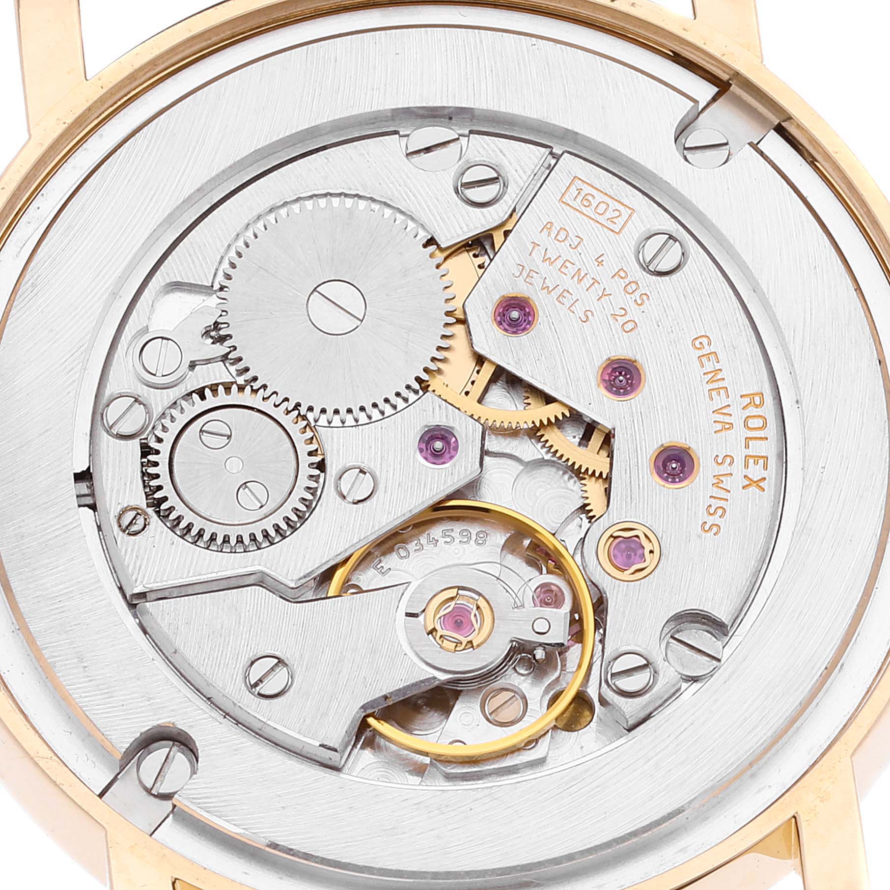 This image shows the intricate movement and internal mechanics of the Rolex Cellini 5115 Men
s Yellow Gold Silver Dial 5115 Men
s Yellow Gold Silver Dial watch from a back view.