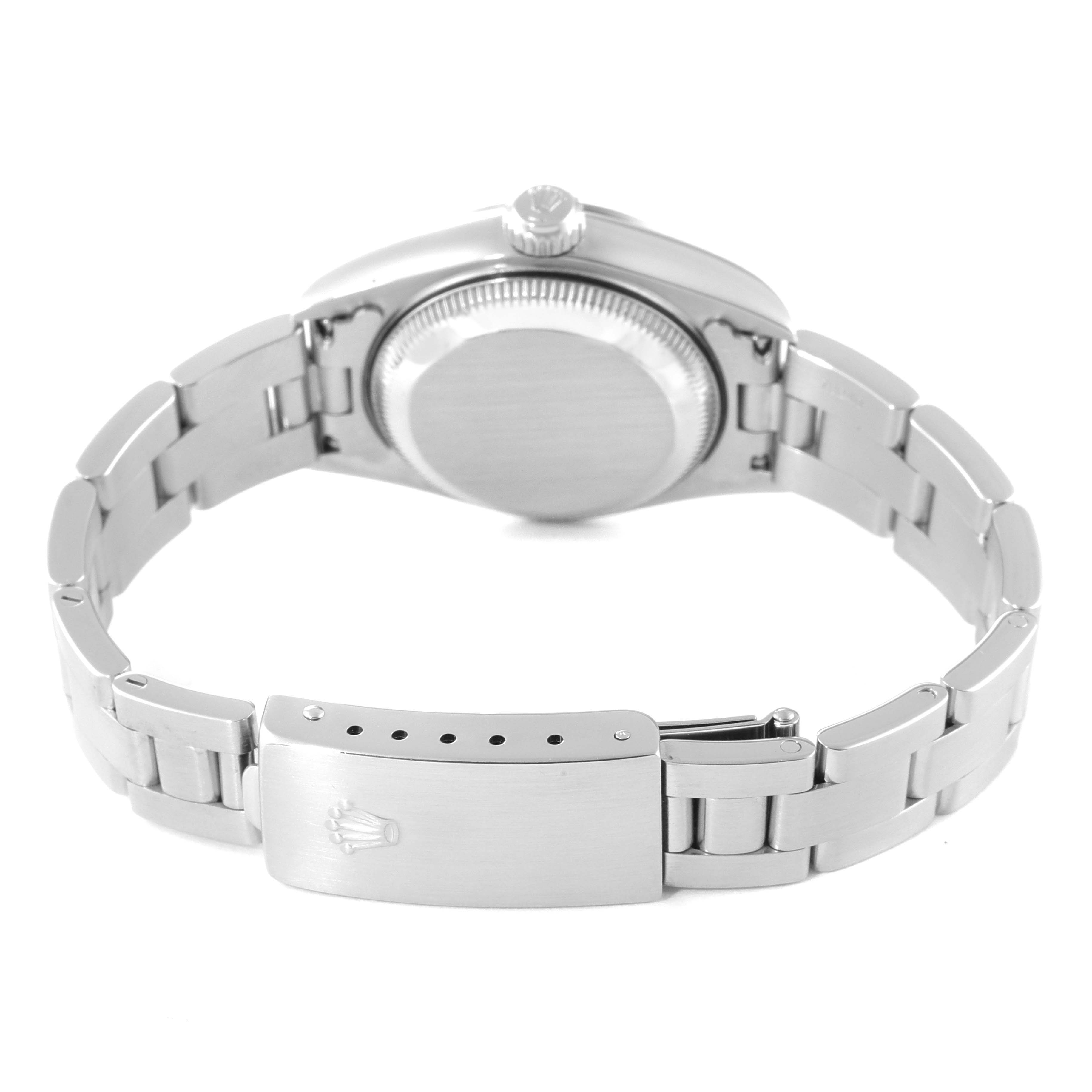 The image shows the back view of a Rolex Date 79160 Women
s Stainless Steel Blue Dial 79160 Women
s Stainless Steel Blue Dial model watch, featuring the case back, crown, and clasp.