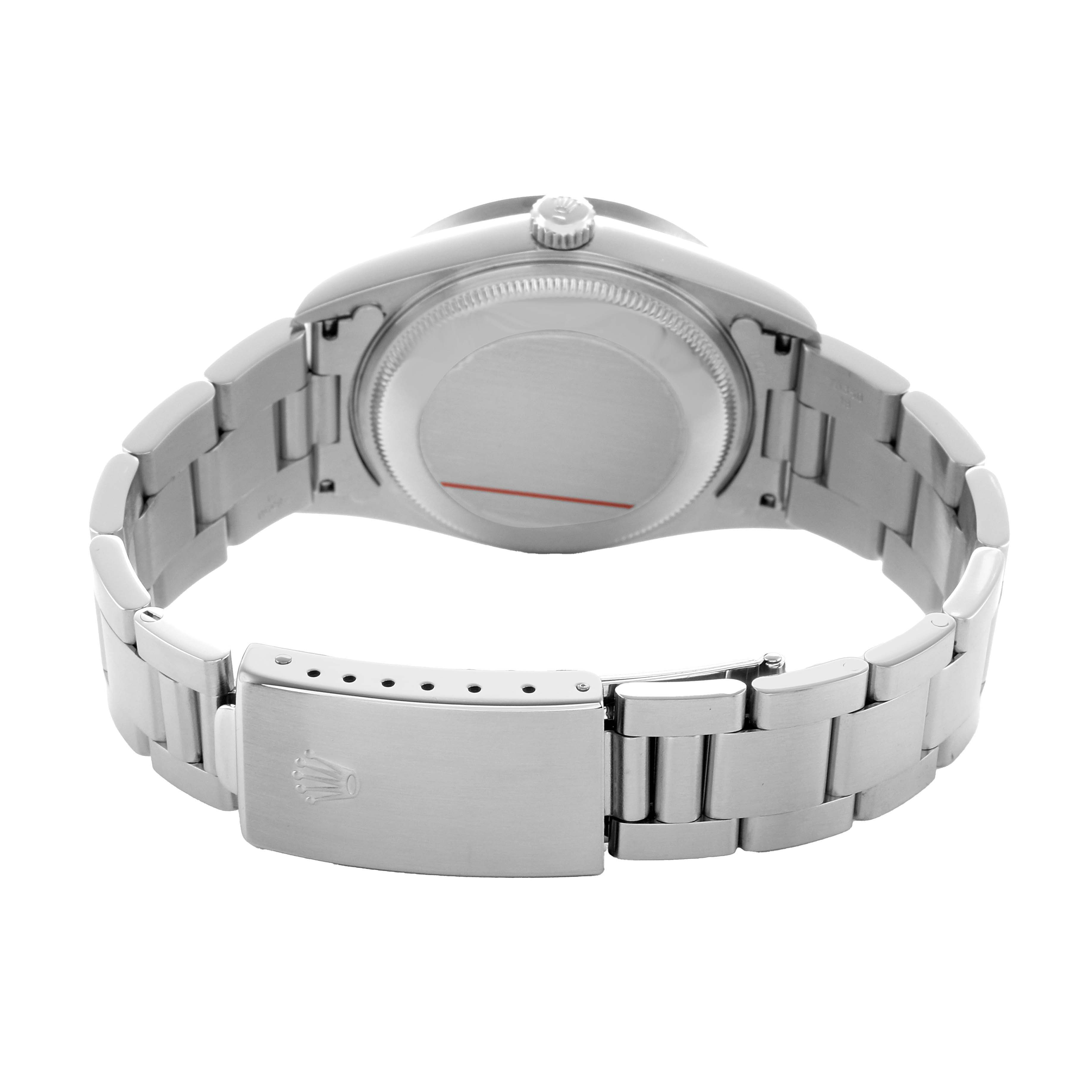 The image shows the back of a Rolex Date 15210 Men's Stainless Steel Silver Dial model, highlighting the case back, bracelet, and clasp.