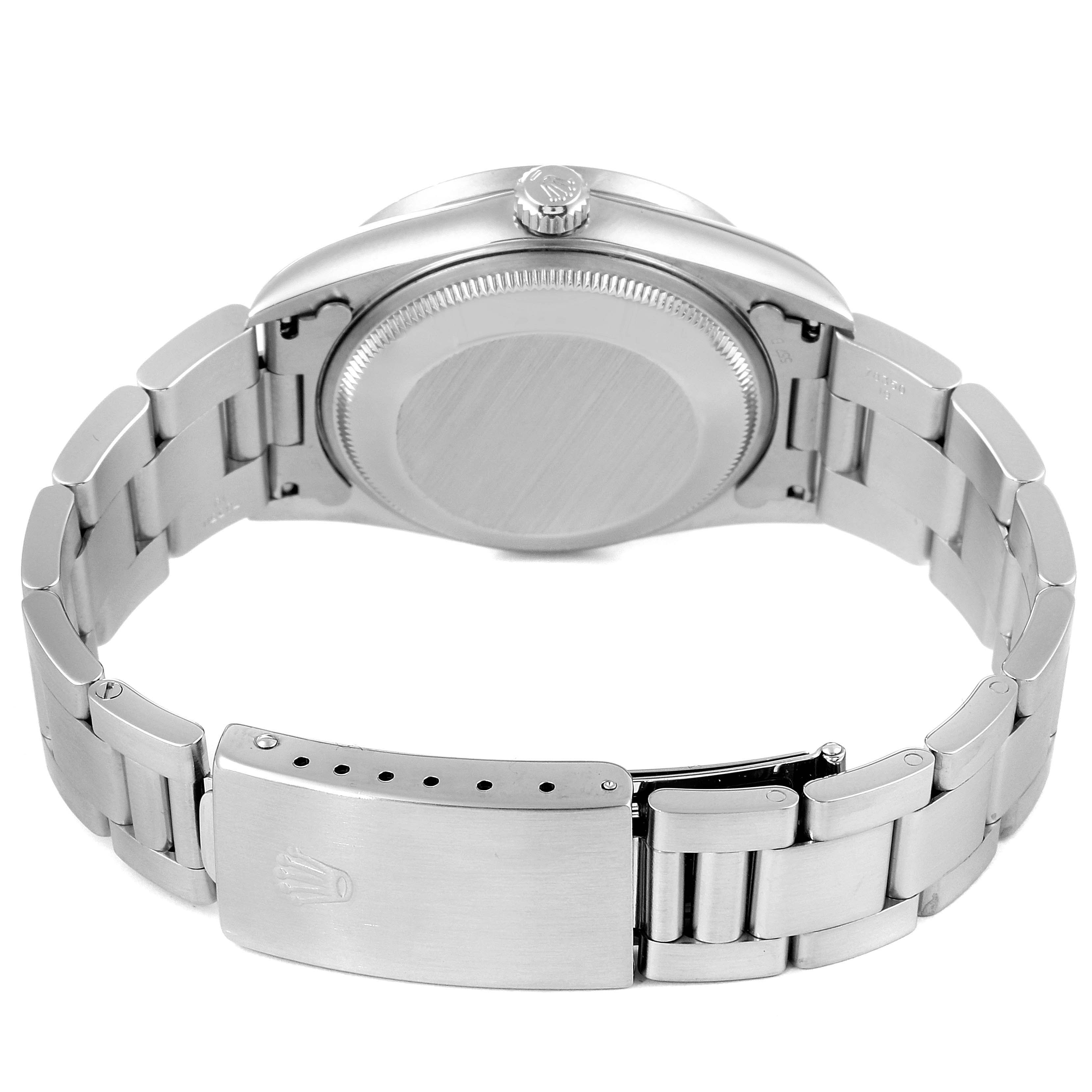 The image shows the back case and bracelet of a Rolex Date 15210 Men's Stainless Steel Silver Dial 15210 Men's Stainless Steel Silver Dial model watch viewed from the rear.