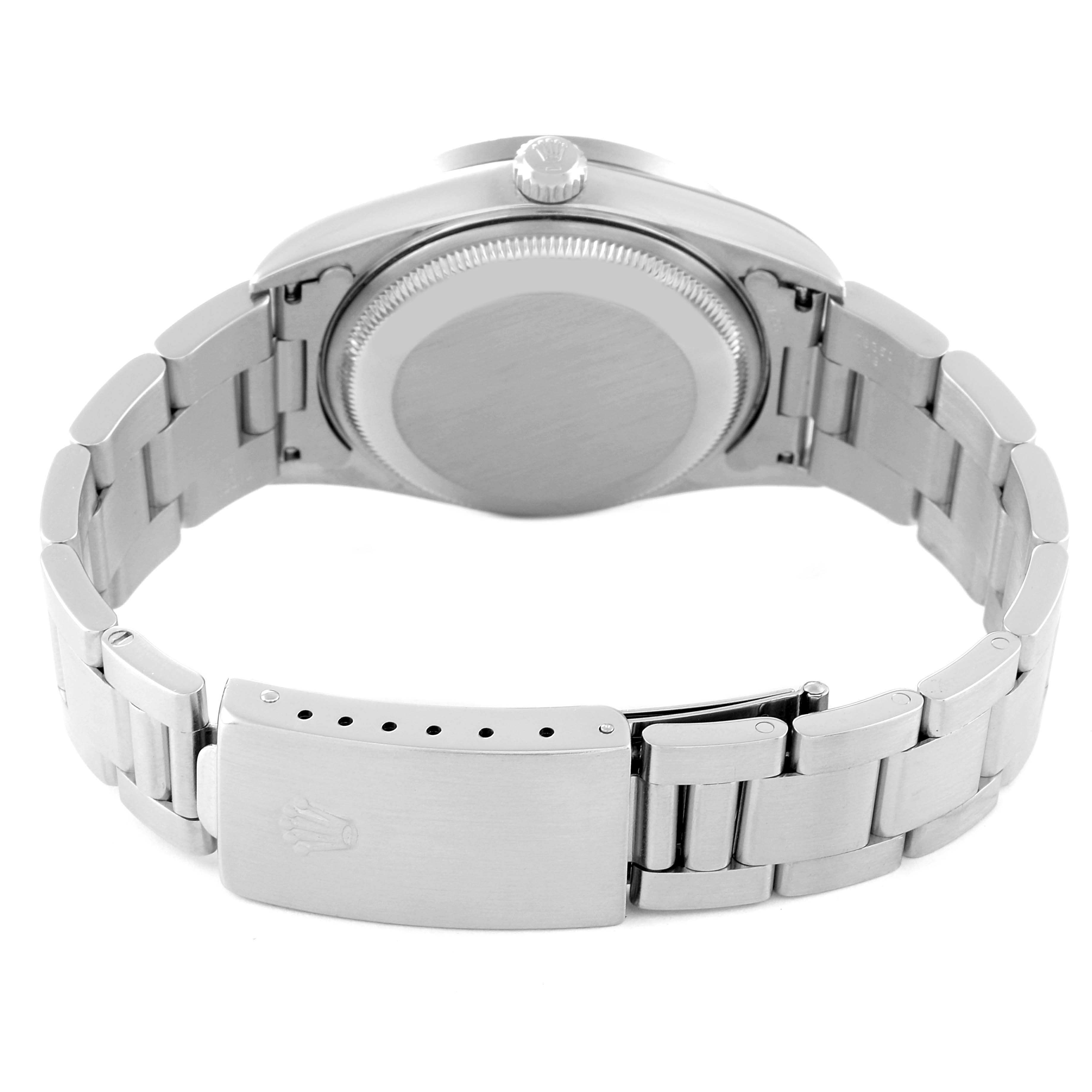 This image shows the back of a Rolex Date 15210 Men's Stainless Steel White Dial 15210 Men's Stainless Steel White Dial model watch with its clasp open.