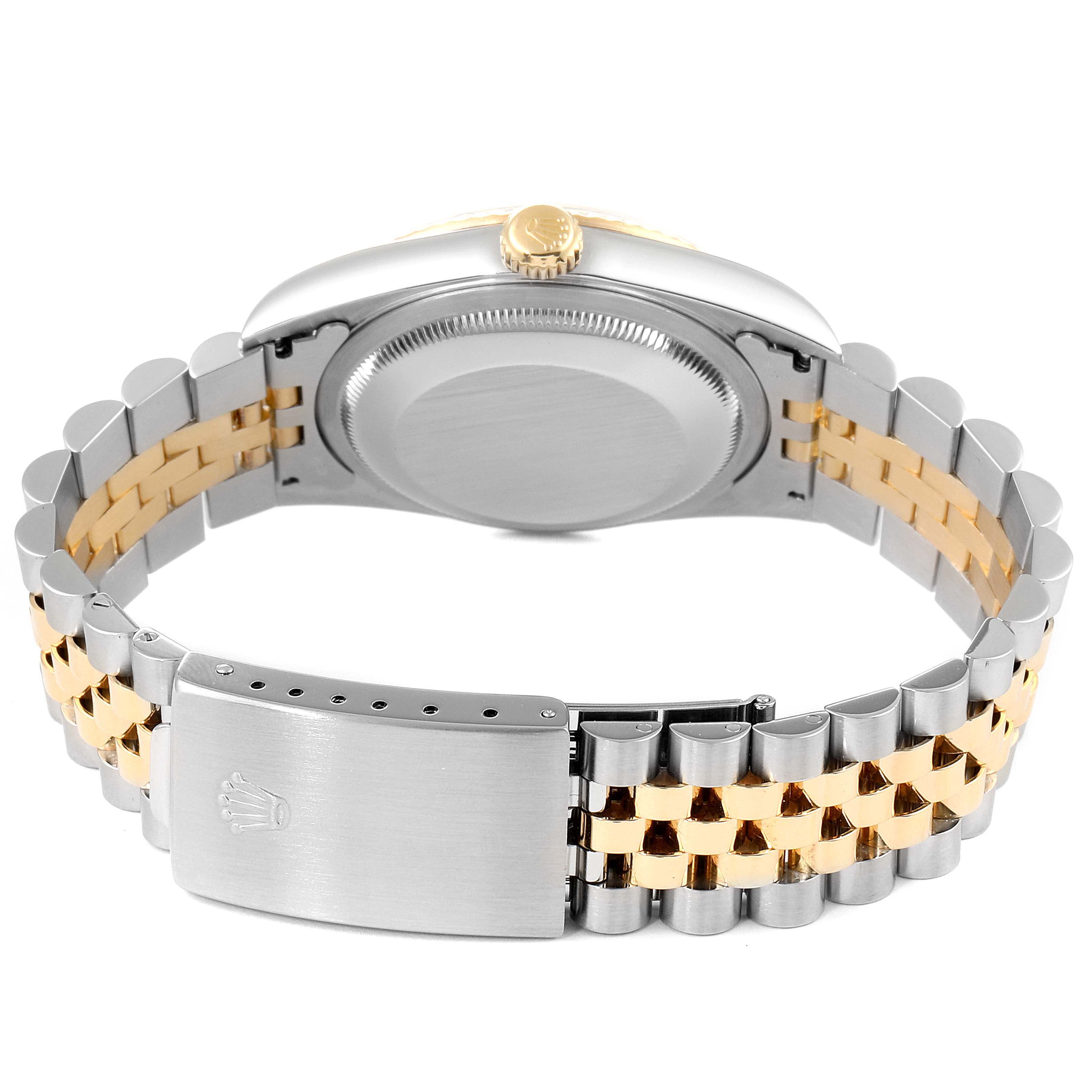 The image shows the back case and bracelet of a Rolex Datejust 16233 Men's Steel and Gold (two tone) Champagne Dial 16233 Men's Steel and Gold (two tone) Champagne Dial watch, viewed from the rear angle.