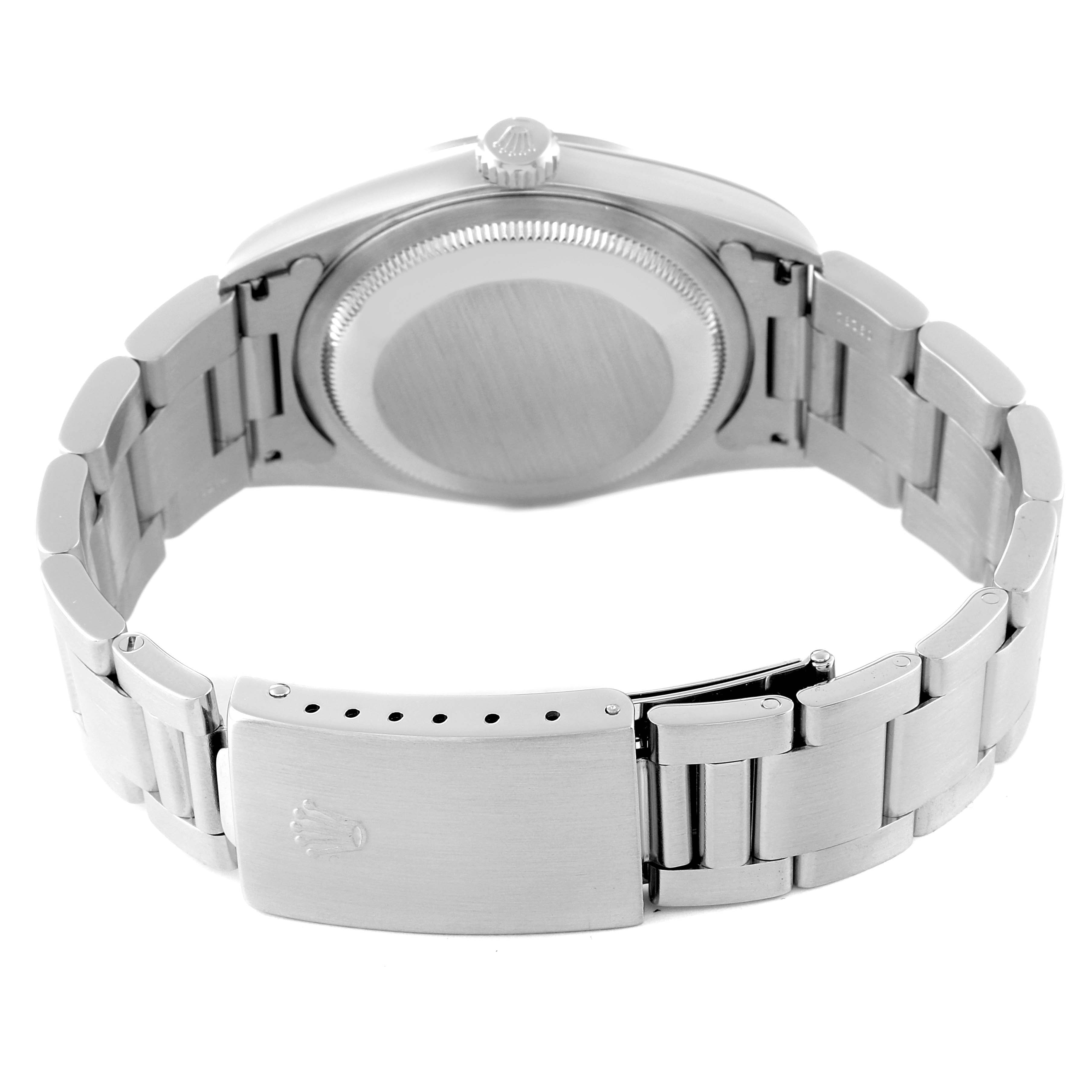 The image shows the back view of a Rolex Datejust 16200 Men's Stainless Steel Black Dial 16200 Men's Stainless Steel Black Dial watch, highlighting the case back, crown, and closed stainless steel bracelet with clasp.