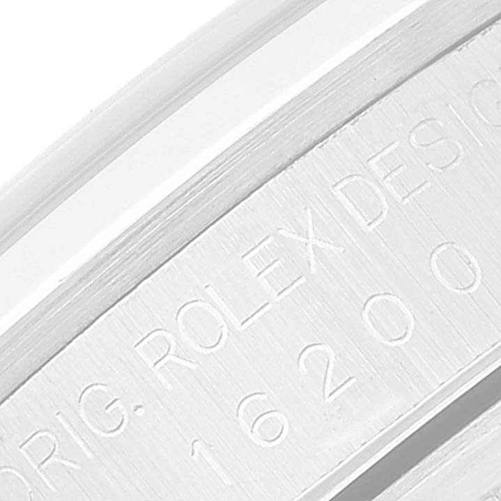 This close-up image shows the engraved details on the casing of a Rolex Datejust 16200 Men's Stainless Steel Black Dial 16200 Men's Stainless Steel Black Dial watch.