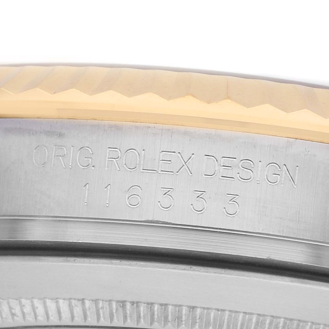 The image shows a close-up of the side of a Rolex Datejust 41 116333 Men's Steel and Gold (two tone) Grey Dial, highlighting the engraved model number and design text.
