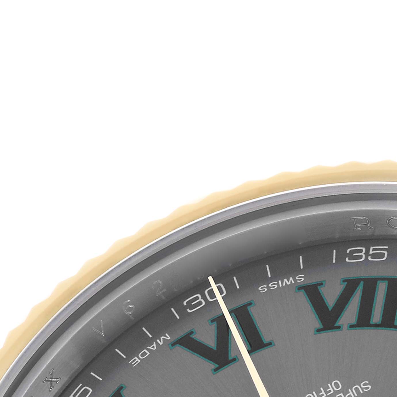 The image shows a close-up of the dial and bezel edge of a Rolex Datejust 41 116333 Men's Steel and Gold (two tone) Grey Dial, displaying Roman numerals and part of the minute track.