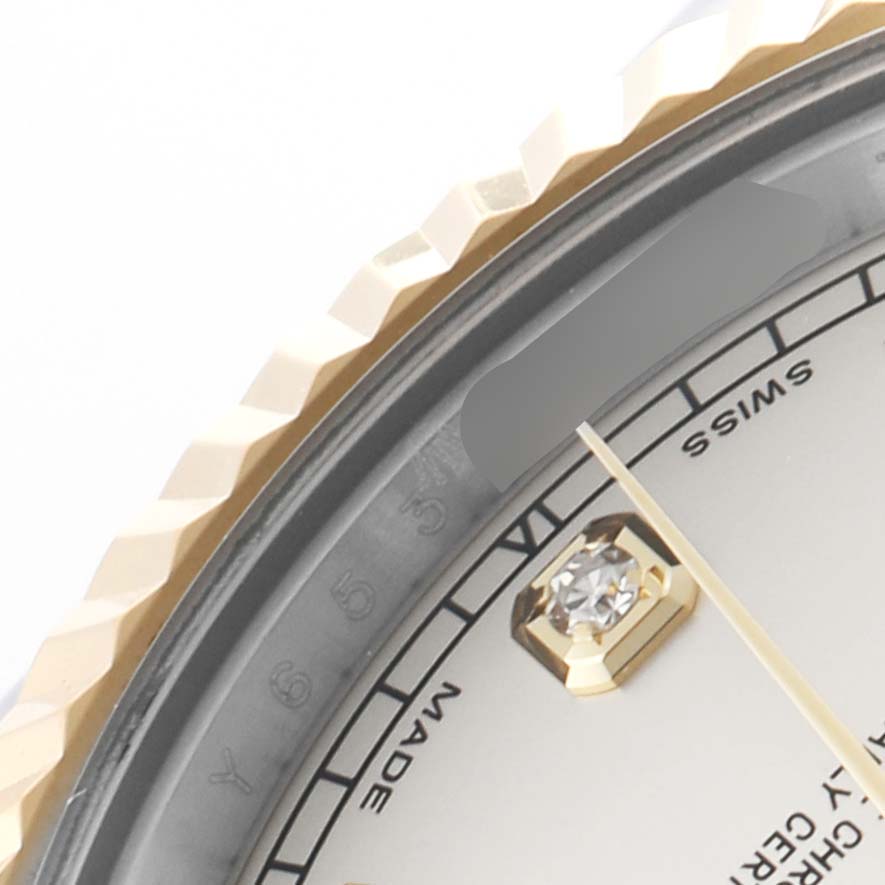 The image shows a close-up of the Rolex Datejust 41 116333 Men's Steel and Gold (two tone) Silver Dial bezel, chapter ring, and part of the dial with hour marker detail.