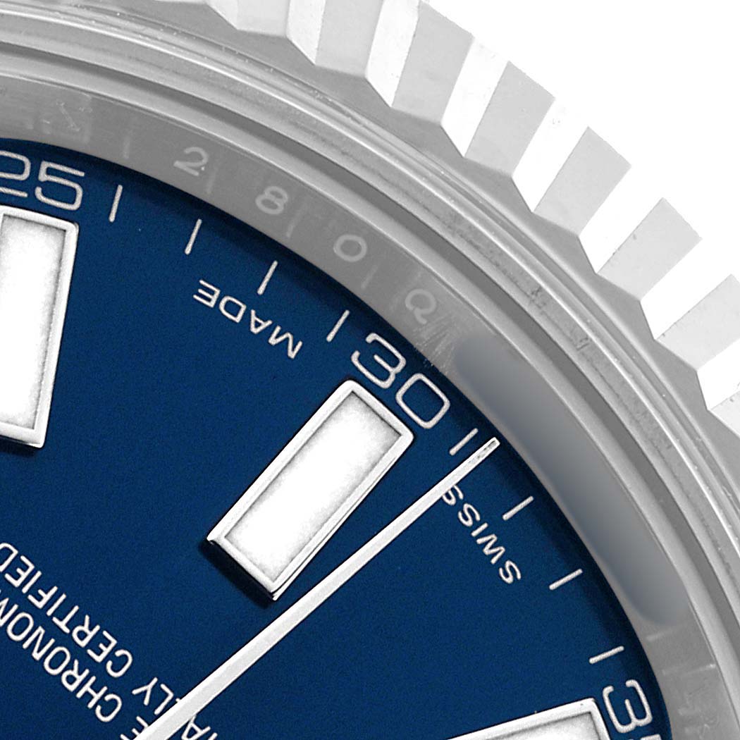 The image shows a close-up of the blue dial, bezel, and indices of the Rolex Datejust 41 116334 Men's Stainless Steel Blue Dial.