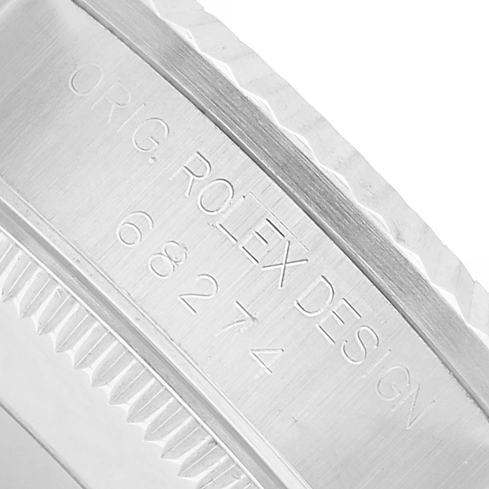 The image shows a close-up of the case side, displaying the engraved design number "68274" on the Rolex Mid-Size 68274 Women's Stainless Steel Blue Dial model.