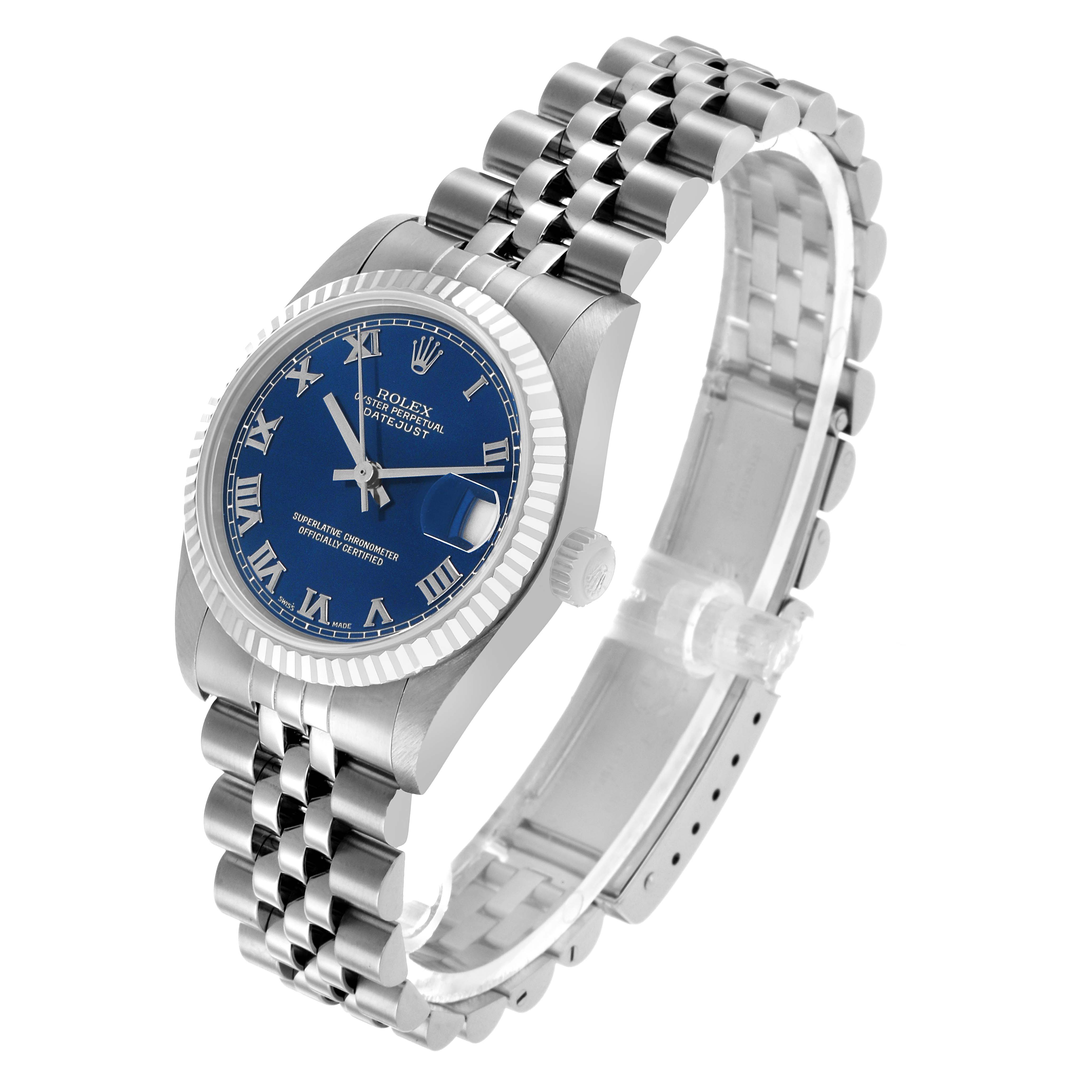 The Rolex Mid-Size 68274 Women's Stainless Steel Blue Dial model is shown at a slight angle, displaying the face, bezel, crown, and part of the bracelet.